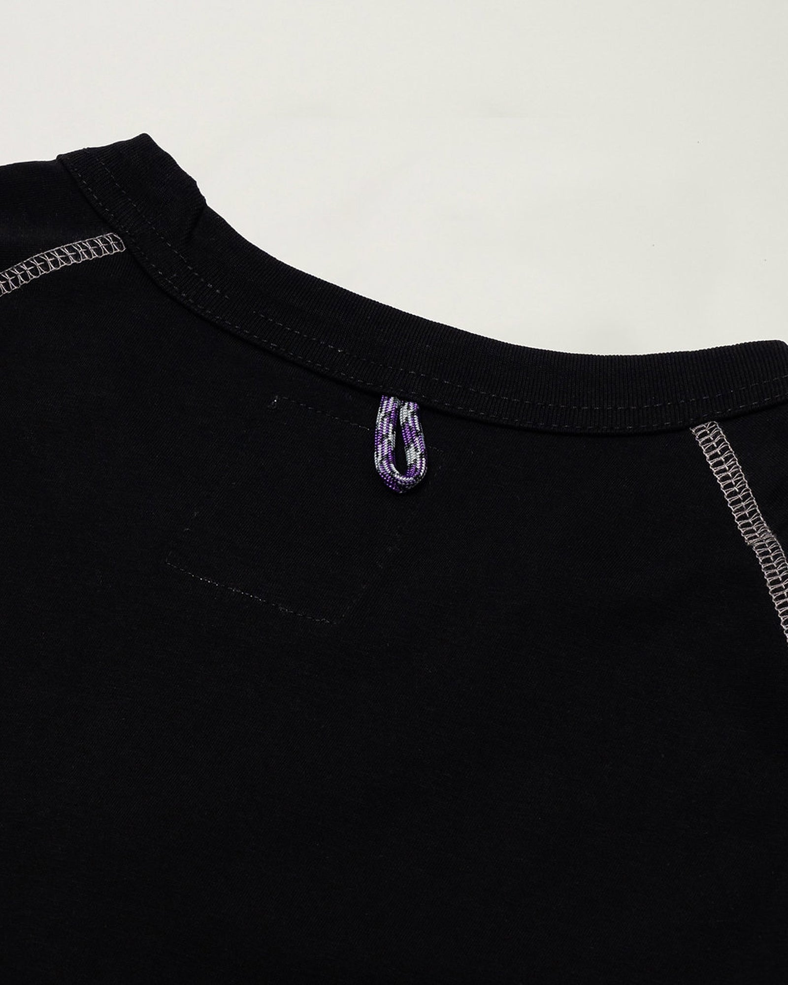 A Eckhaus Latta Shirt pictured on a model in front of a white background. The title of the product is Eckhaus Latta Eclipse Turtleneck - Stone and the image was taken by 199A®.