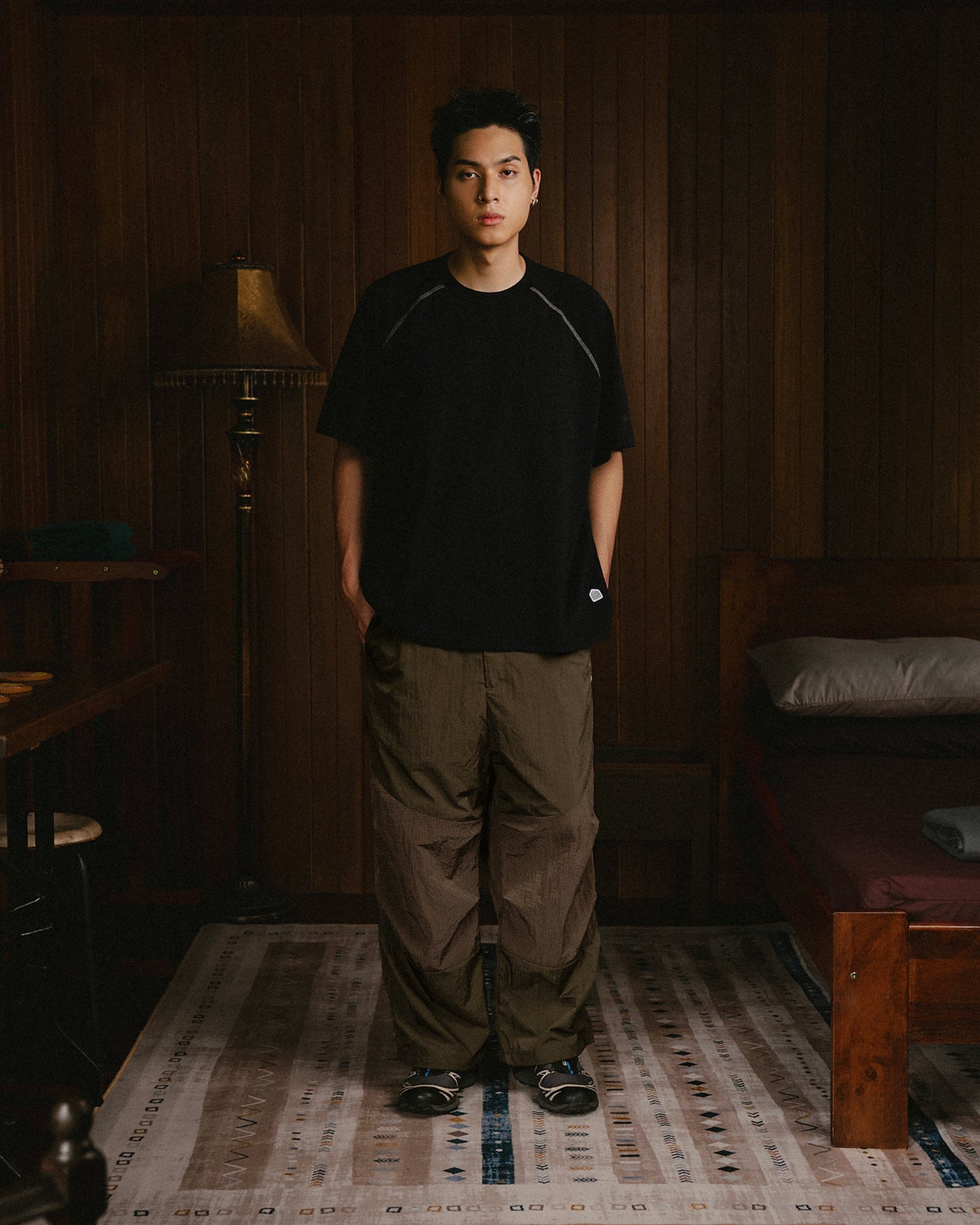 A Eckhaus Latta Shirt pictured on a model in front of a white background. The title of the product is Eckhaus Latta Eclipse Turtleneck - Stone and the image was taken by 199A®.