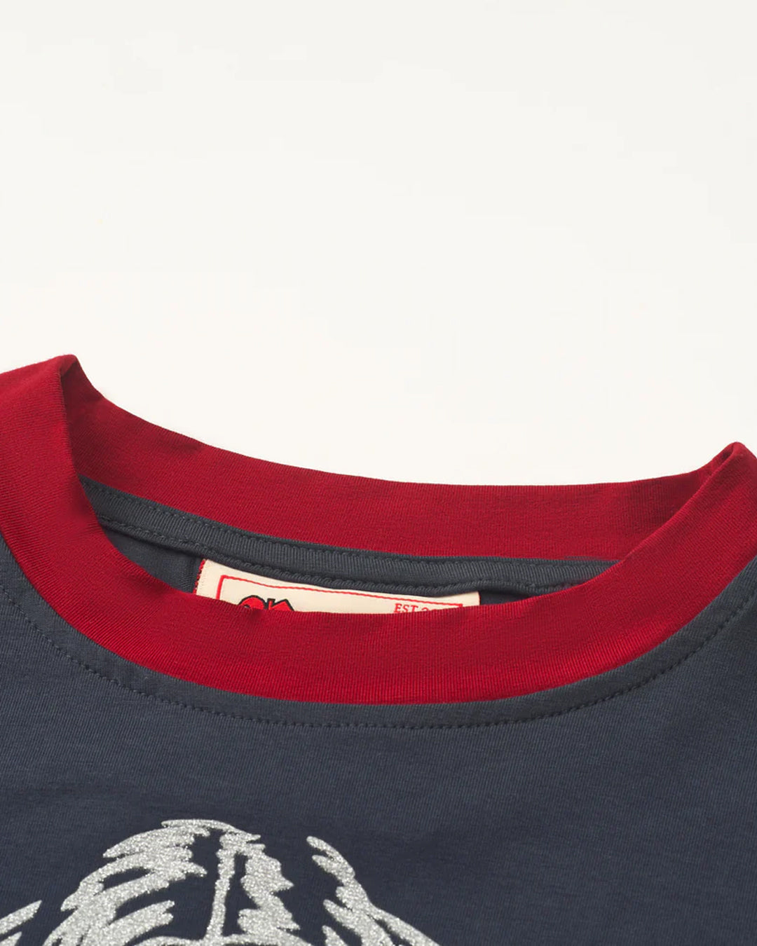 A Eckhaus Latta Shirt pictured on a model in front of a white background. The title of the product is Eckhaus Latta Eclipse Turtleneck - Stone and the image was taken by 199A®.