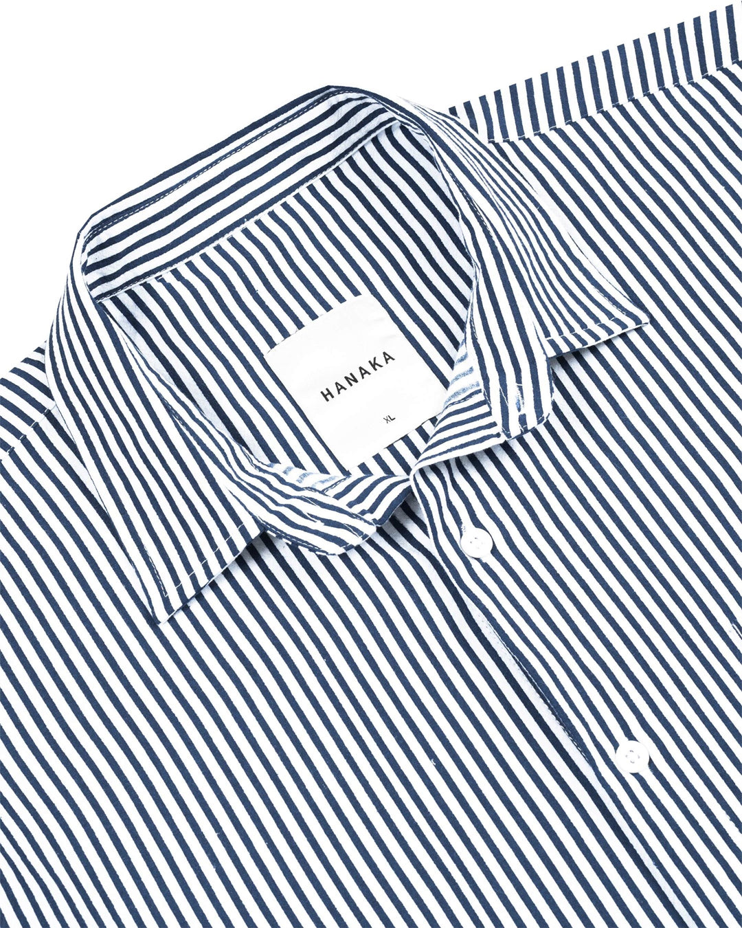A Eckhaus Latta Shirt pictured on a model in front of a white background. The title of the product is Eckhaus Latta Eclipse Turtleneck - Stone and the image was taken by 199A®.