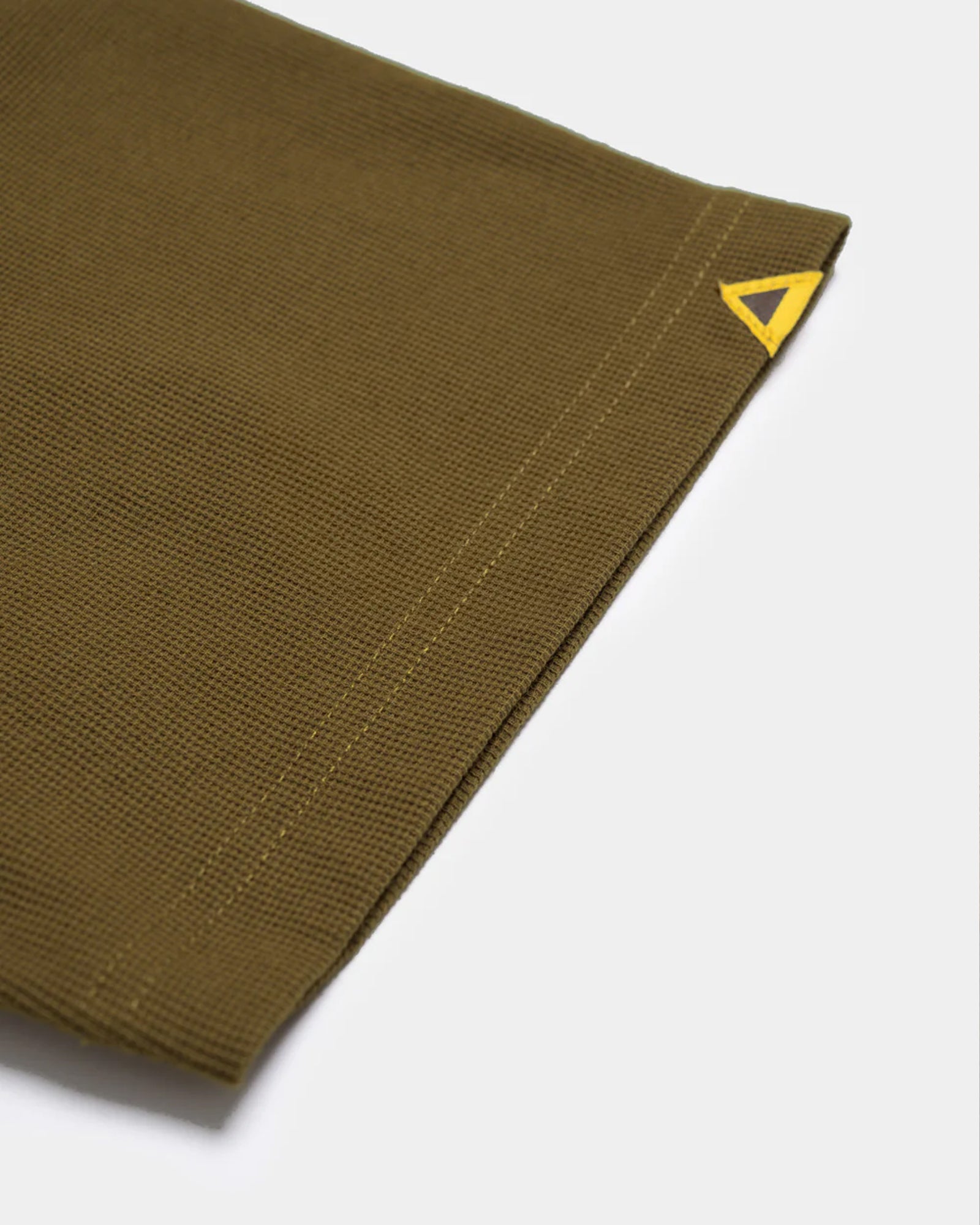 A Eckhaus Latta Shirt pictured on a model in front of a white background. The title of the product is Eckhaus Latta Eclipse Turtleneck - Stone and the image was taken by 199A®.