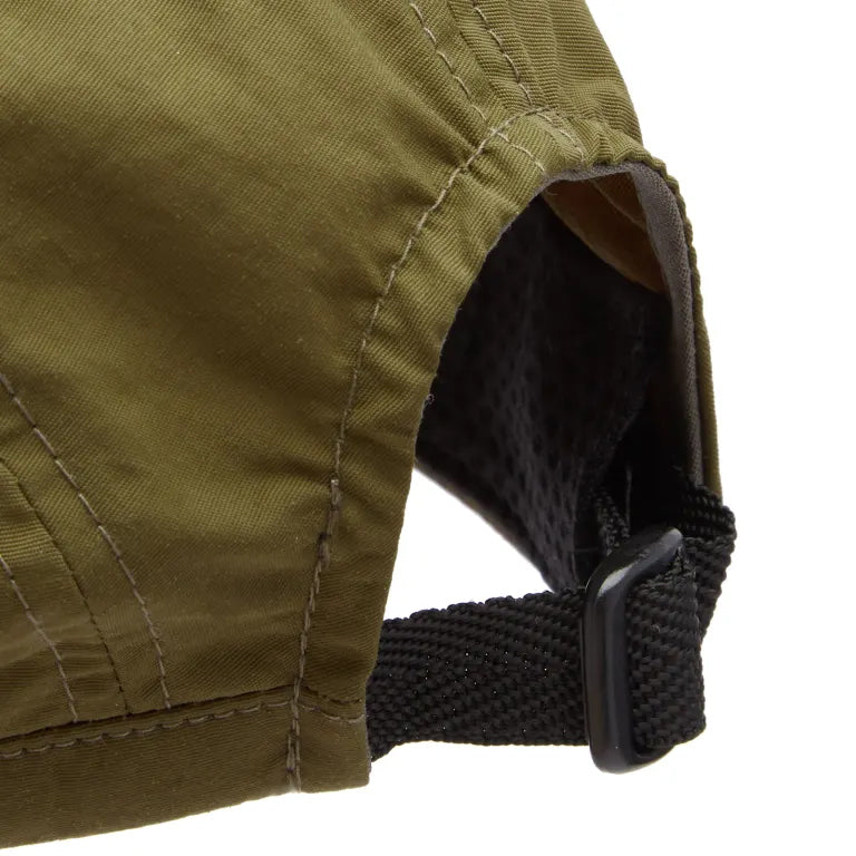 A Eckhaus Latta Shirt pictured on a model in front of a white background. The title of the product is Eckhaus Latta Eclipse Turtleneck - Stone and the image was taken by 199A®.