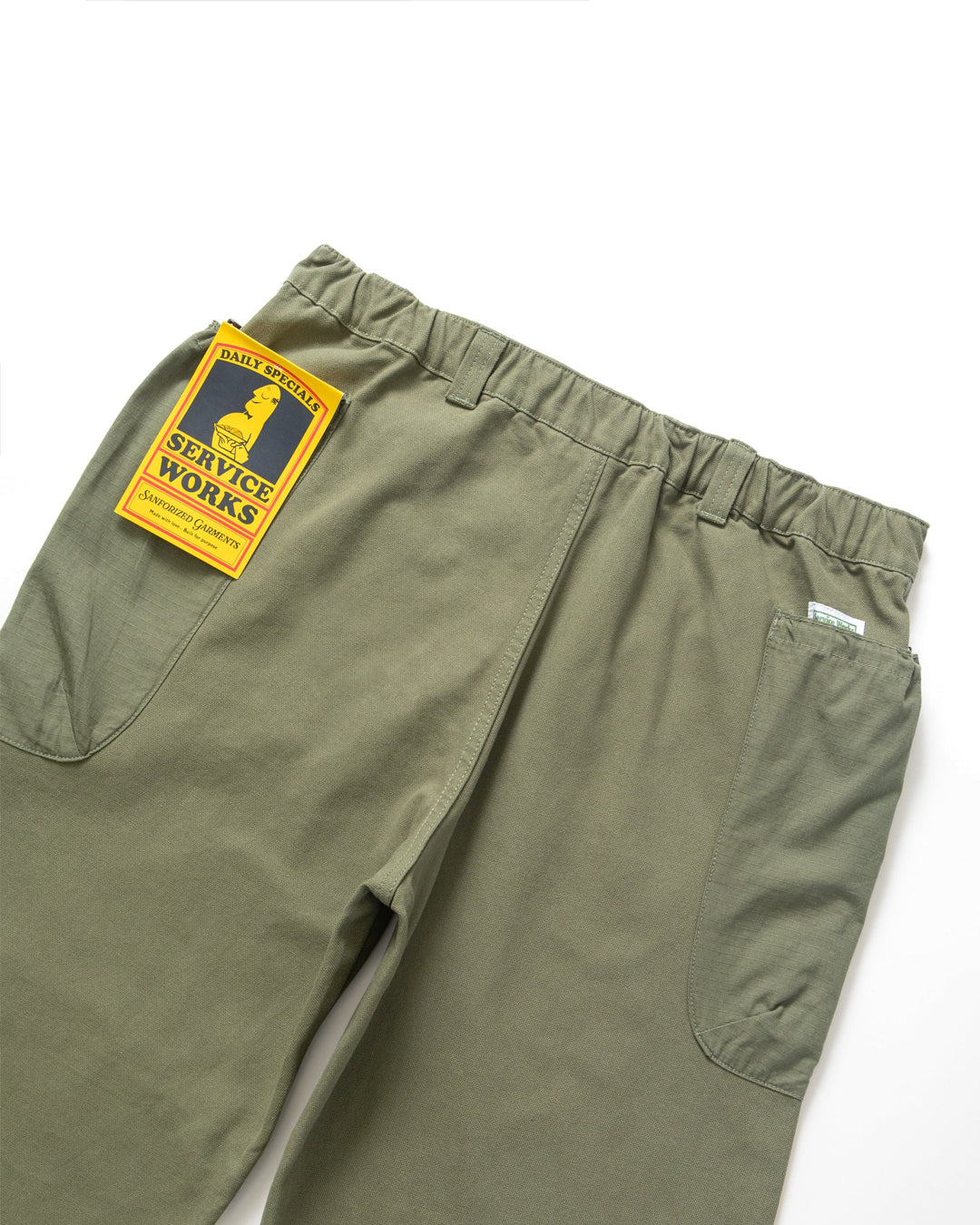 A Eckhaus Latta Shirt pictured on a model in front of a white background. The title of the product is Eckhaus Latta Eclipse Turtleneck - Stone and the image was taken by 199A®.