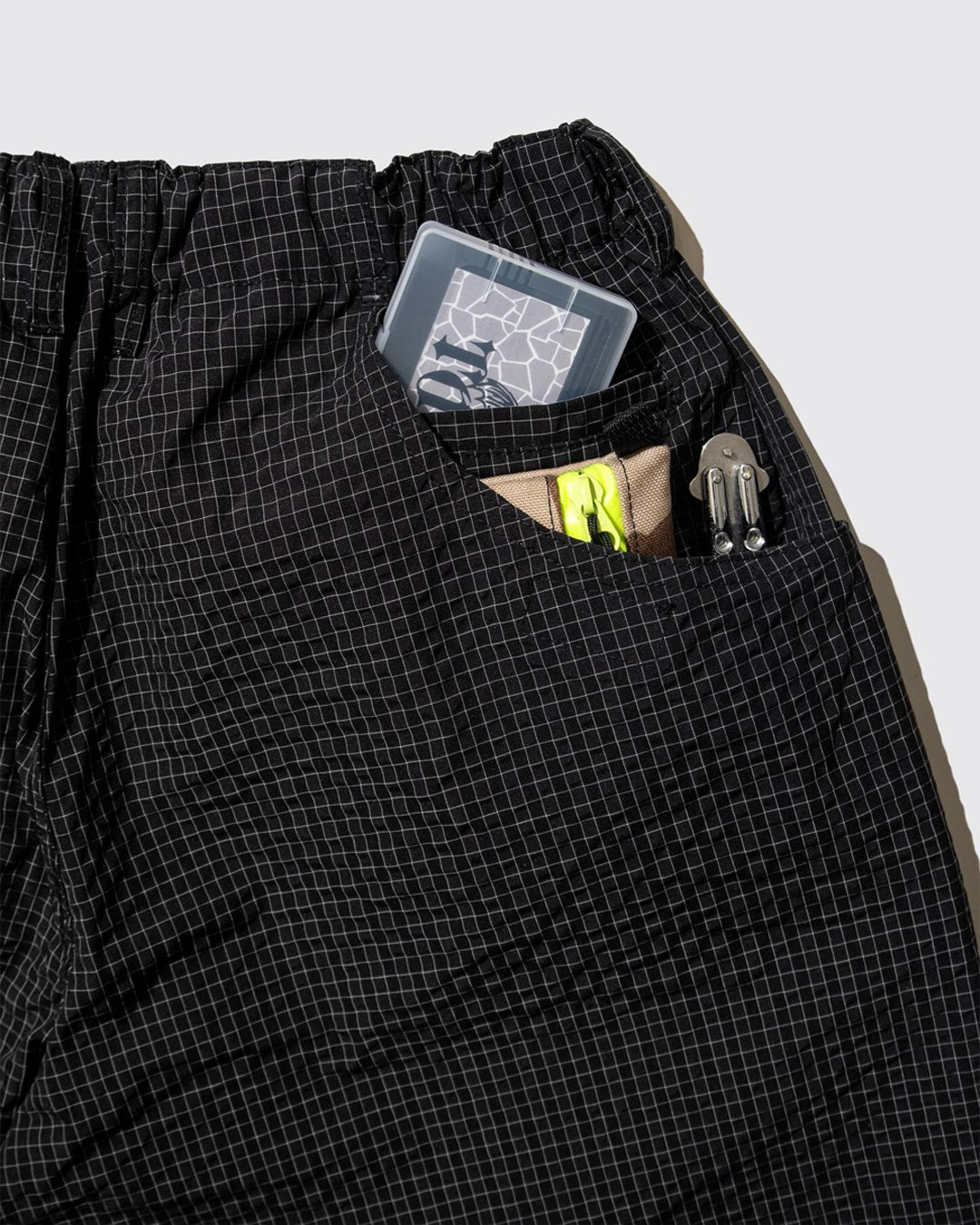 A Eckhaus Latta Shirt pictured on a model in front of a white background. The title of the product is Eckhaus Latta Eclipse Turtleneck - Stone and the image was taken by 199A®.