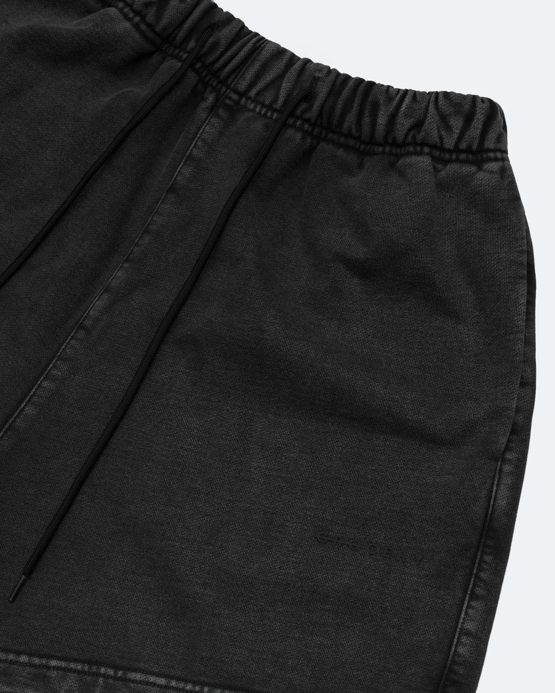 A Eckhaus Latta Shirt pictured on a model in front of a white background. The title of the product is Eckhaus Latta Eclipse Turtleneck - Stone and the image was taken by 199A®.