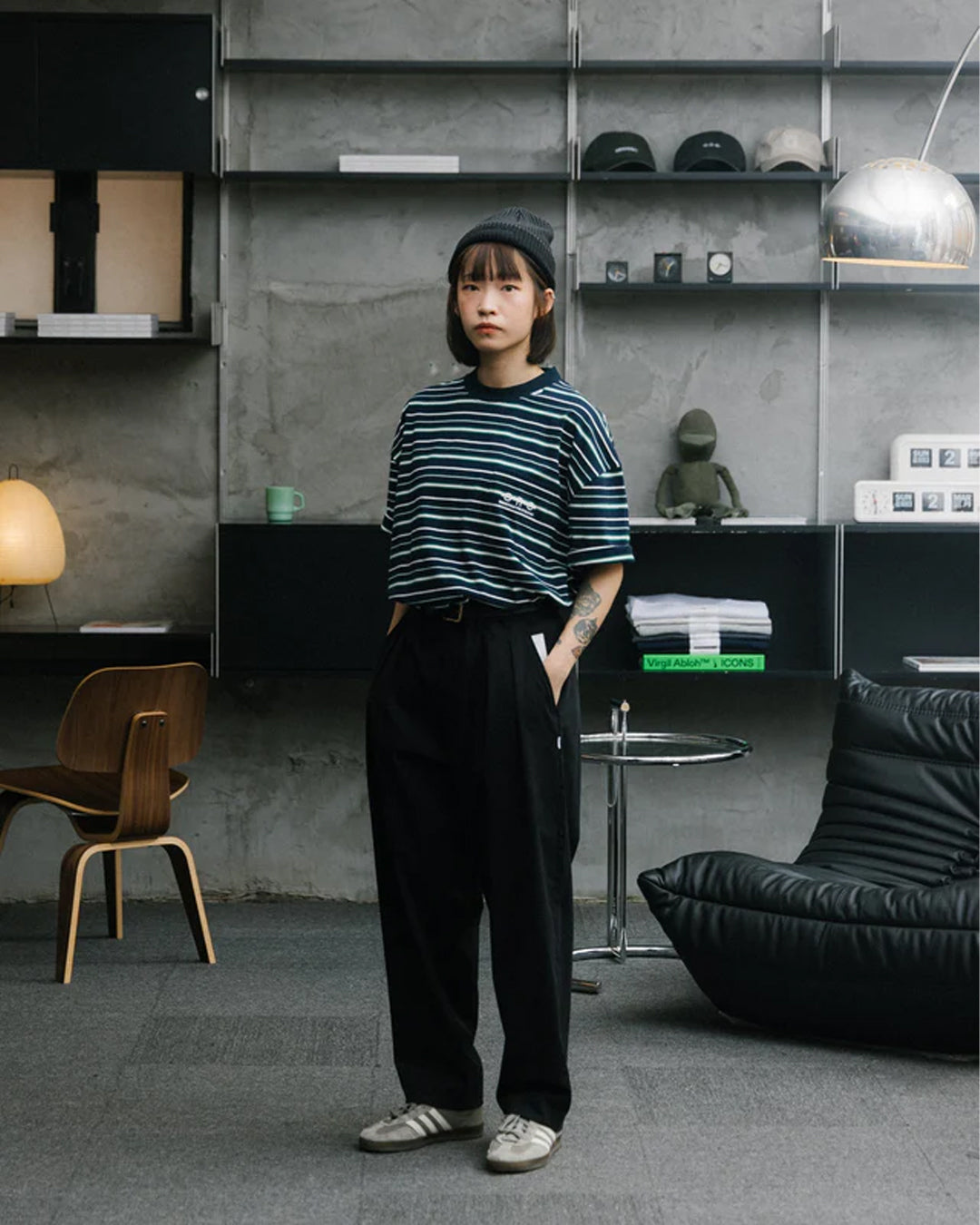 A Eckhaus Latta Shirt pictured on a model in front of a white background. The title of the product is Eckhaus Latta Eclipse Turtleneck - Stone and the image was taken by 199A®.