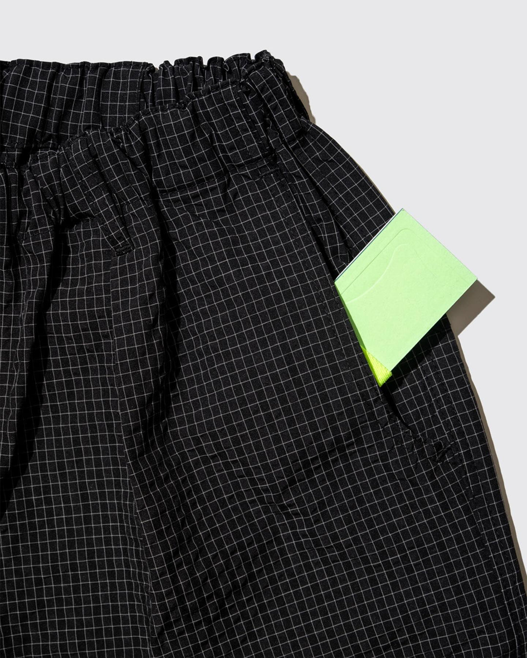 A Eckhaus Latta Shirt pictured on a model in front of a white background. The title of the product is Eckhaus Latta Eclipse Turtleneck - Stone and the image was taken by 199A®.