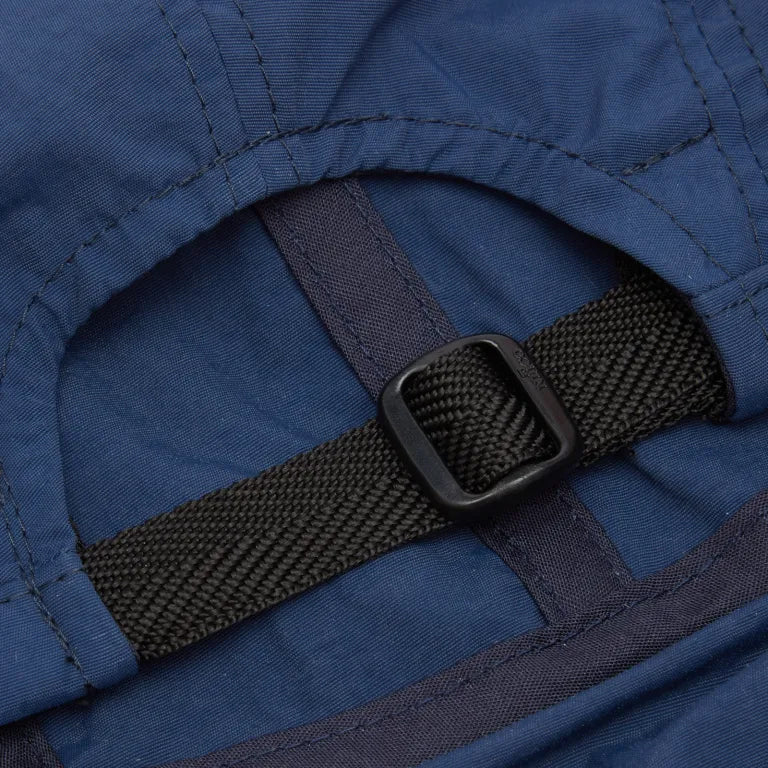 A Eckhaus Latta Shirt pictured on a model in front of a white background. The title of the product is Eckhaus Latta Eclipse Turtleneck - Stone and the image was taken by 199A®.