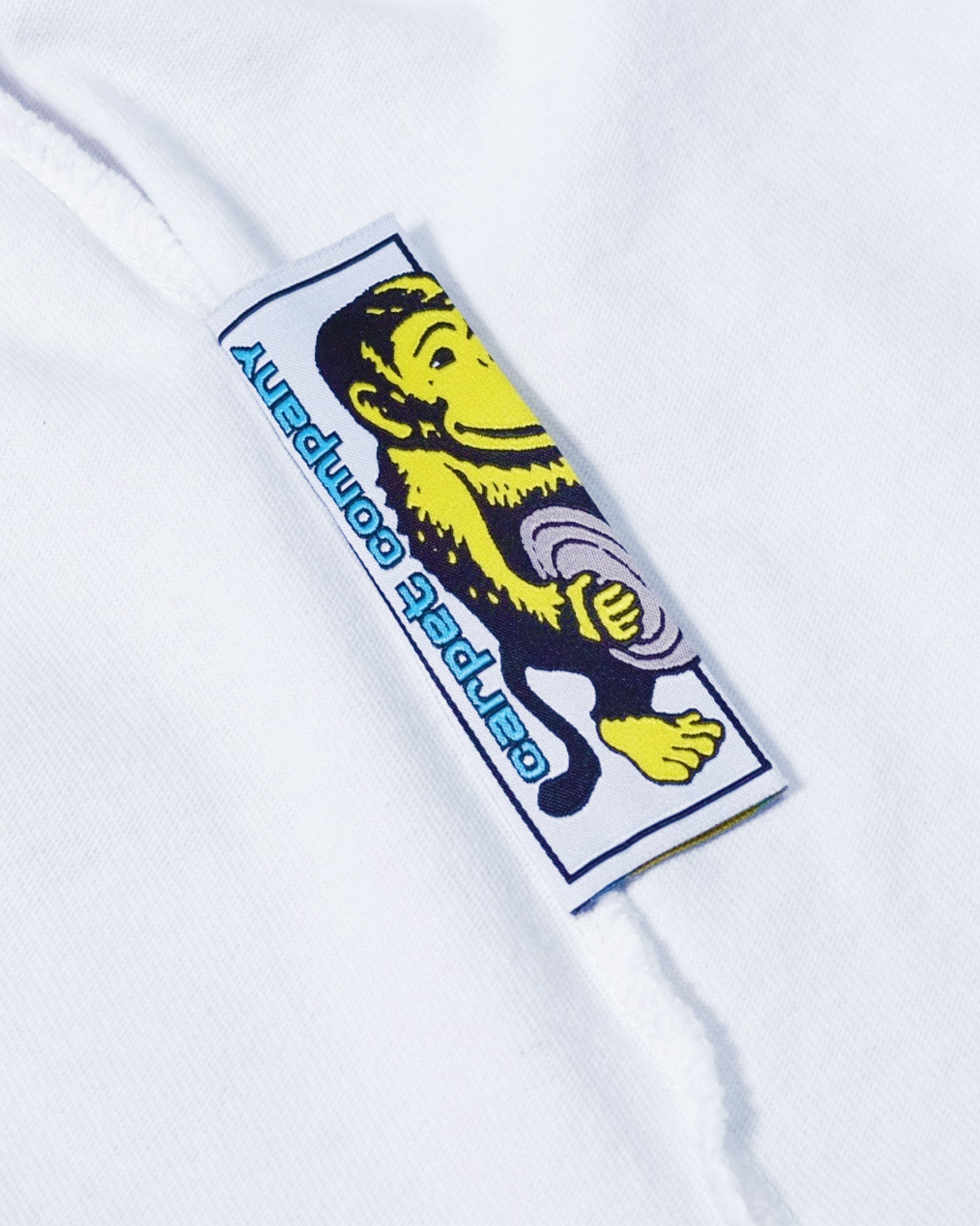 A Eckhaus Latta Shirt pictured on a model in front of a white background. The title of the product is Eckhaus Latta Eclipse Turtleneck - Stone and the image was taken by 199A®.