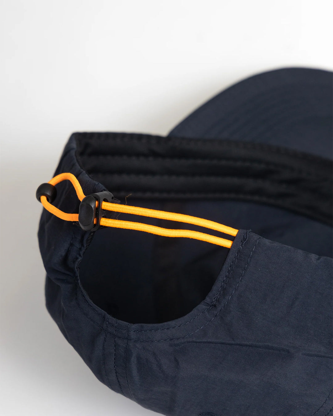 A Eckhaus Latta Shirt pictured on a model in front of a white background. The title of the product is Eckhaus Latta Eclipse Turtleneck - Stone and the image was taken by 199A®.