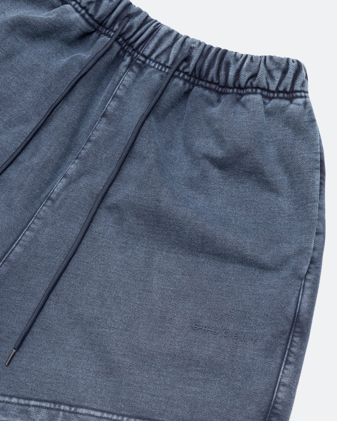 A Eckhaus Latta Shirt pictured on a model in front of a white background. The title of the product is Eckhaus Latta Eclipse Turtleneck - Stone and the image was taken by 199A®.