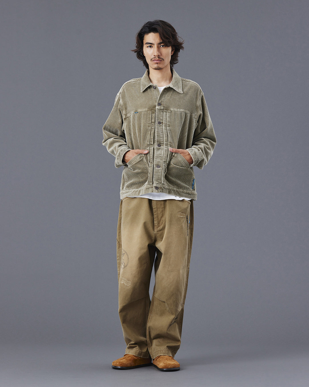 A Eckhaus Latta Shirt pictured on a model in front of a white background. The title of the product is Eckhaus Latta Eclipse Turtleneck - Stone and the image was taken by 199A®.