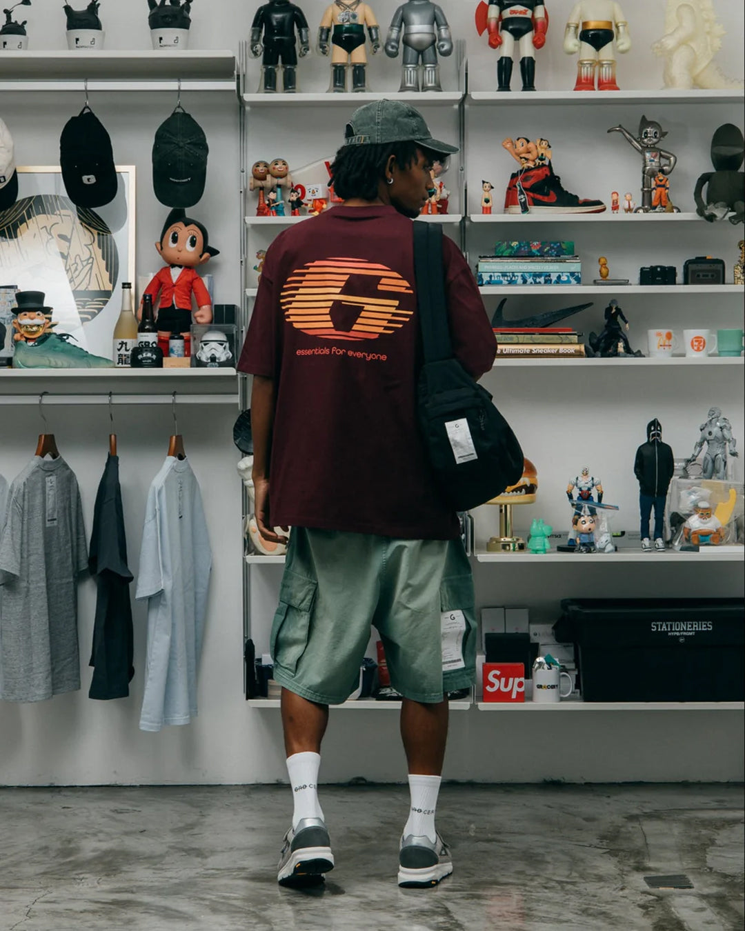 A Eckhaus Latta Shirt pictured on a model in front of a white background. The title of the product is Eckhaus Latta Eclipse Turtleneck - Stone and the image was taken by 199A®.