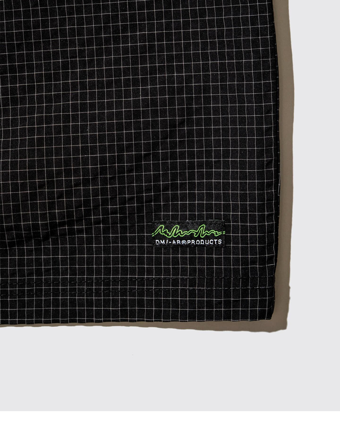 A Eckhaus Latta Shirt pictured on a model in front of a white background. The title of the product is Eckhaus Latta Eclipse Turtleneck - Stone and the image was taken by 199A®.