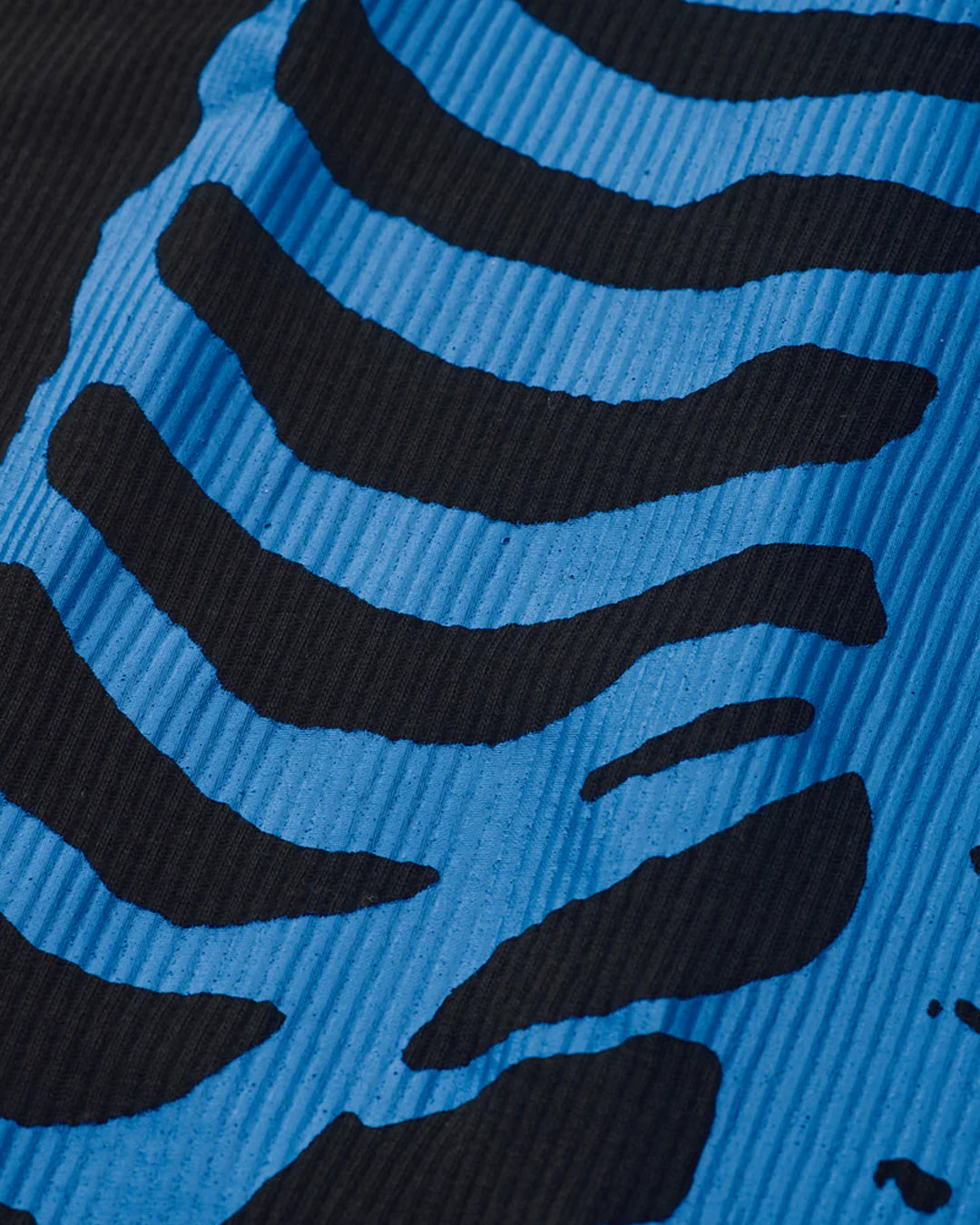 A Eckhaus Latta Shirt pictured on a model in front of a white background. The title of the product is Eckhaus Latta Eclipse Turtleneck - Stone and the image was taken by 199A®.