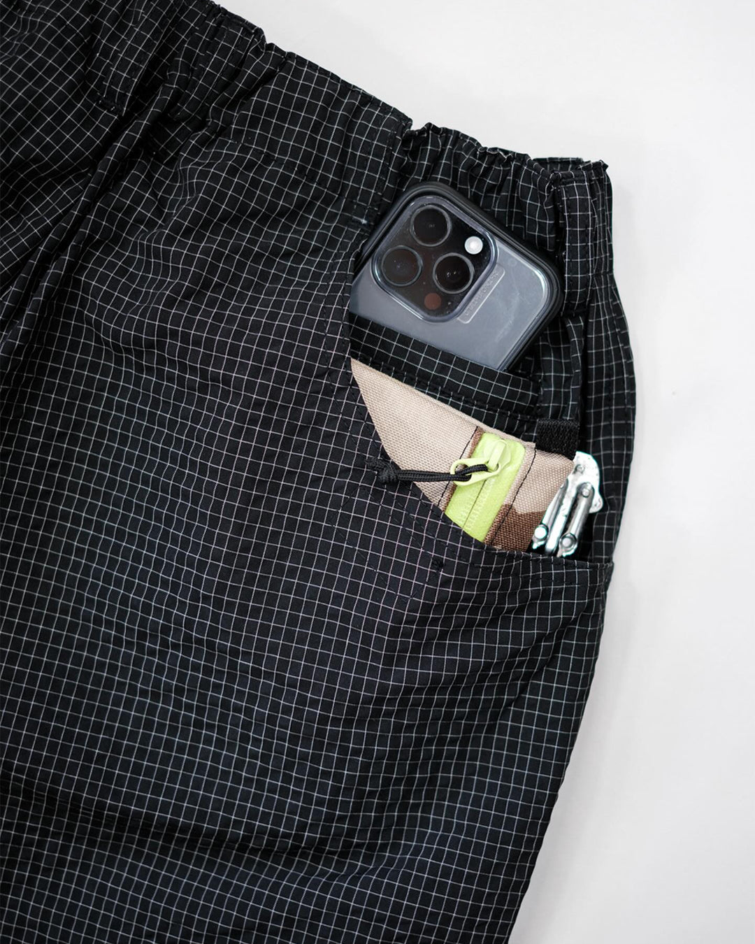 A Eckhaus Latta Shirt pictured on a model in front of a white background. The title of the product is Eckhaus Latta Eclipse Turtleneck - Stone and the image was taken by 199A®.