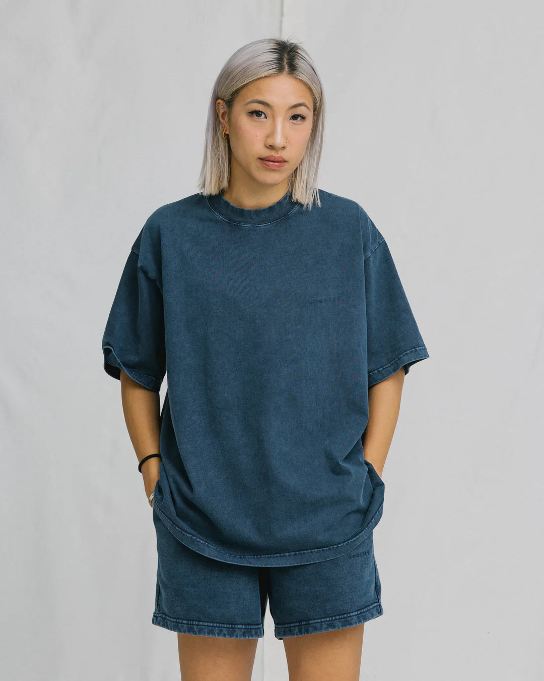 A Eckhaus Latta Shirt pictured on a model in front of a white background. The title of the product is Eckhaus Latta Eclipse Turtleneck - Stone and the image was taken by 199A®.