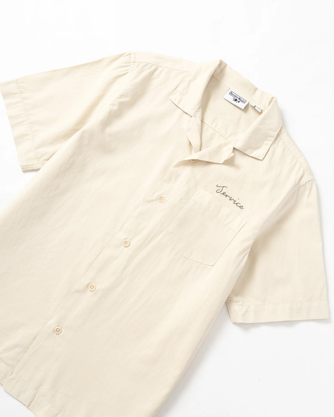 A Eckhaus Latta Shirt pictured on a model in front of a white background. The title of the product is Eckhaus Latta Eclipse Turtleneck - Stone and the image was taken by 199A®.