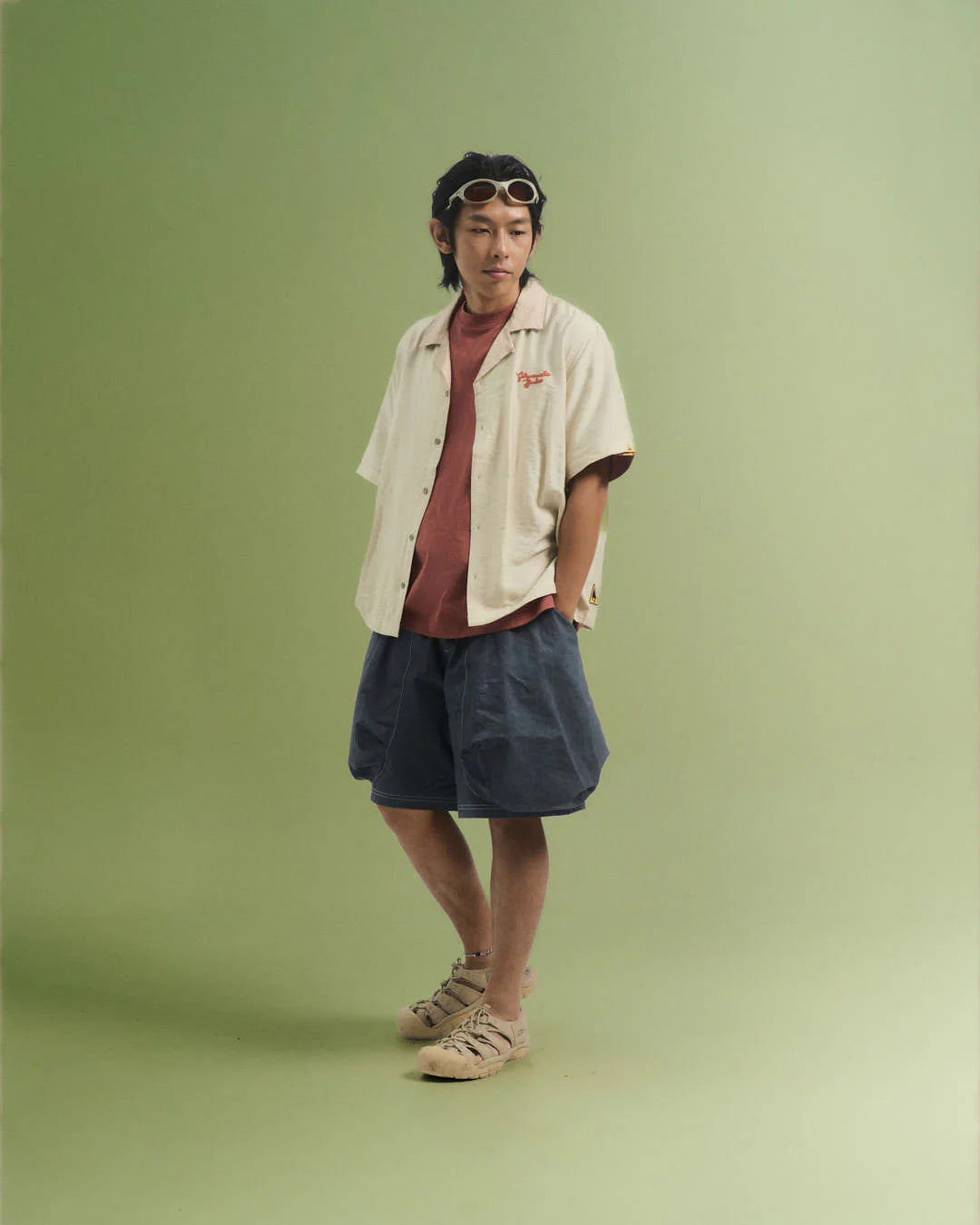 A Eckhaus Latta Shirt pictured on a model in front of a white background. The title of the product is Eckhaus Latta Eclipse Turtleneck - Stone and the image was taken by 199A®.