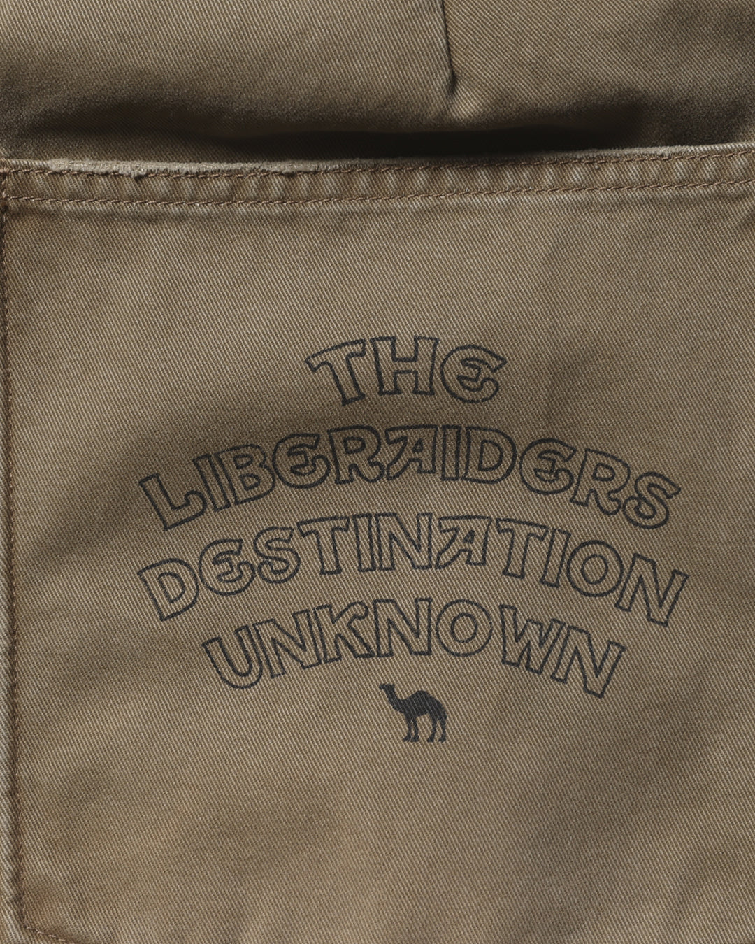 A Eckhaus Latta Shirt pictured on a model in front of a white background. The title of the product is Eckhaus Latta Eclipse Turtleneck - Stone and the image was taken by 199A®.