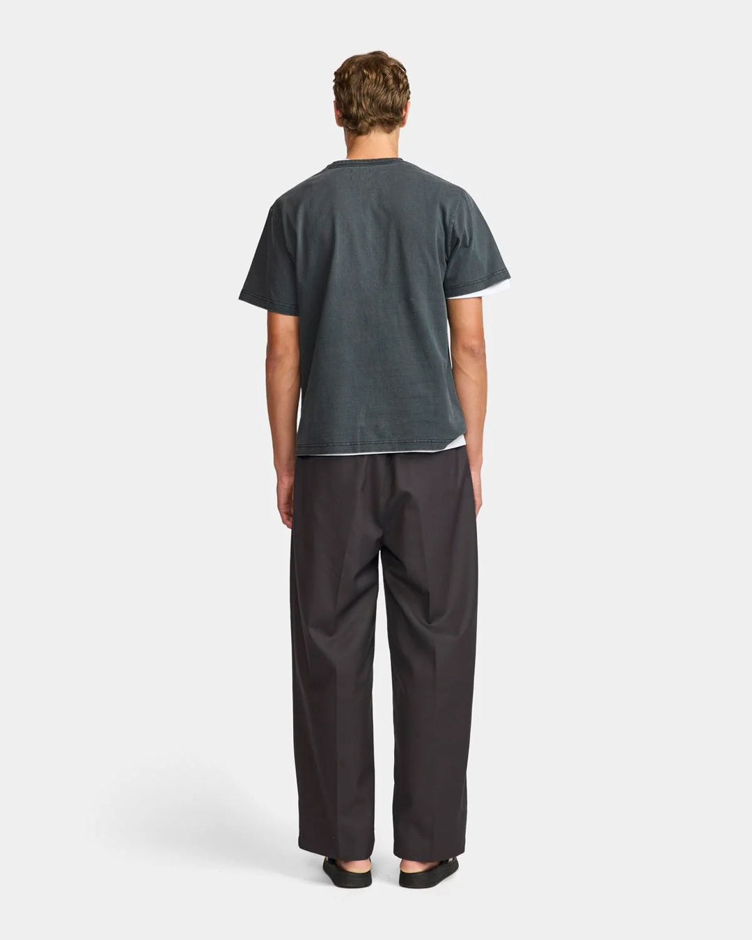 A Eckhaus Latta Shirt pictured on a model in front of a white background. The title of the product is Eckhaus Latta Eclipse Turtleneck - Stone and the image was taken by 199A®.