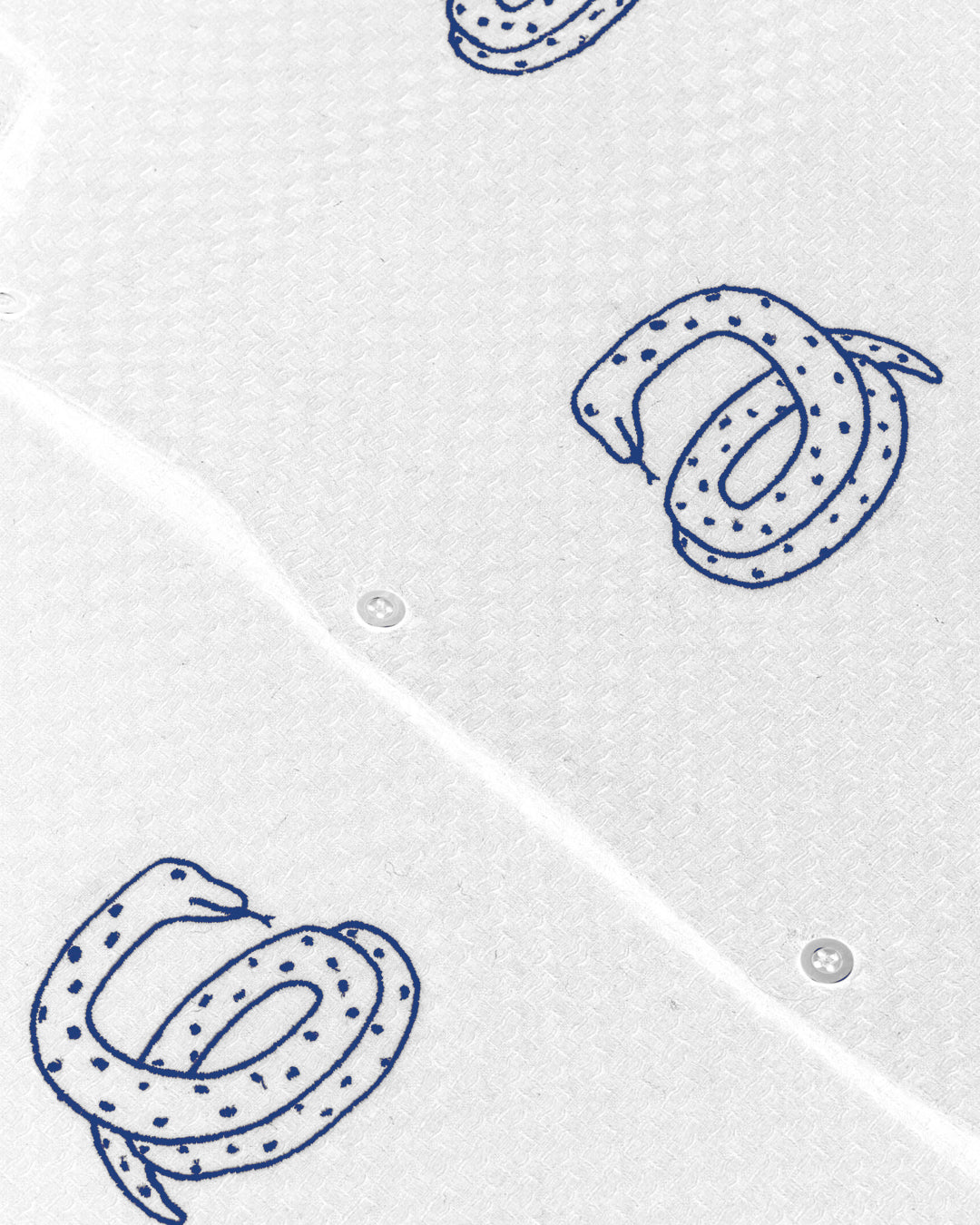 A Eckhaus Latta Shirt pictured on a model in front of a white background. The title of the product is Eckhaus Latta Eclipse Turtleneck - Stone and the image was taken by 199A®.