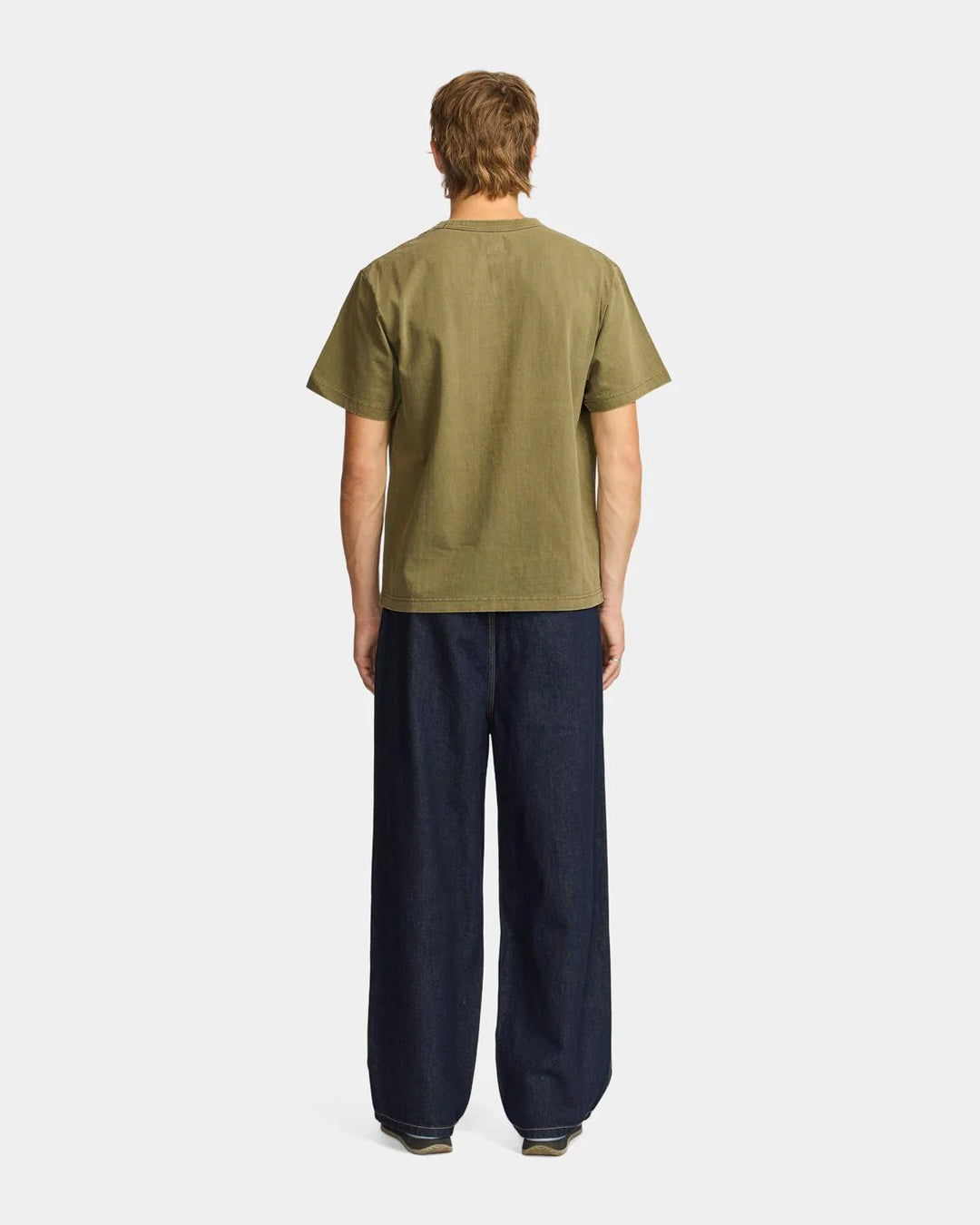 A Eckhaus Latta Shirt pictured on a model in front of a white background. The title of the product is Eckhaus Latta Eclipse Turtleneck - Stone and the image was taken by 199A®.