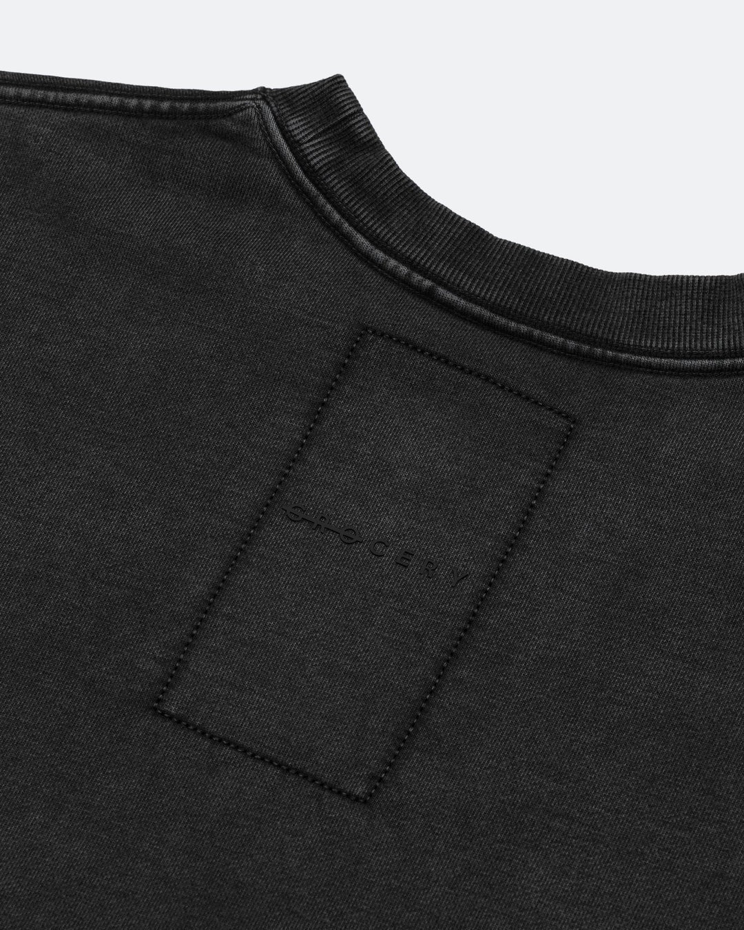 A Eckhaus Latta Shirt pictured on a model in front of a white background. The title of the product is Eckhaus Latta Eclipse Turtleneck - Stone and the image was taken by 199A®.