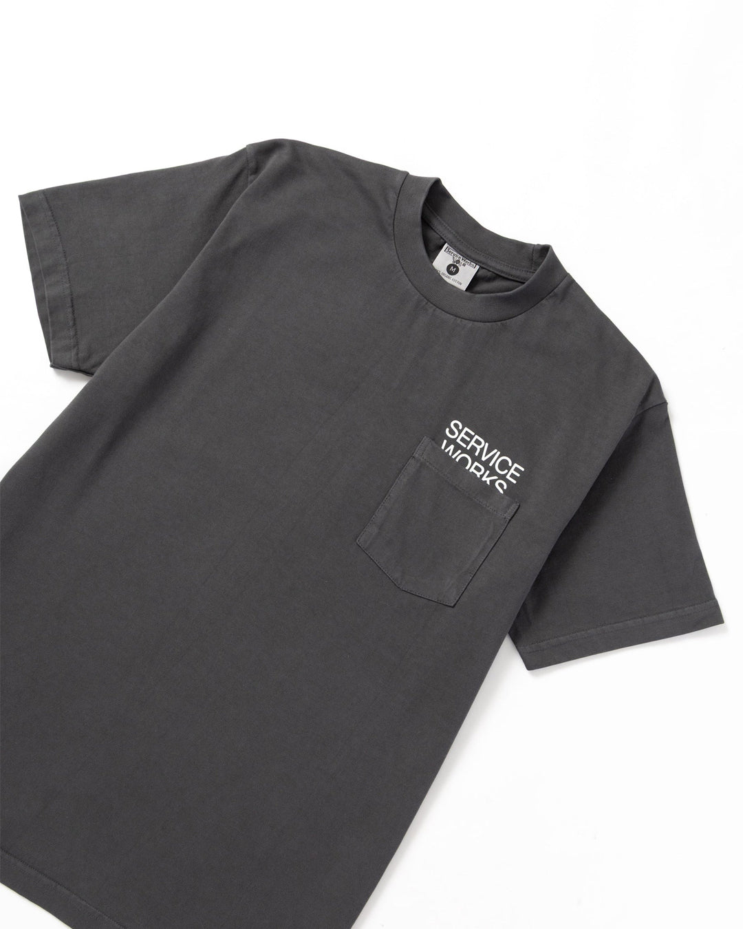 A Eckhaus Latta Shirt pictured on a model in front of a white background. The title of the product is Eckhaus Latta Eclipse Turtleneck - Stone and the image was taken by 199A®.