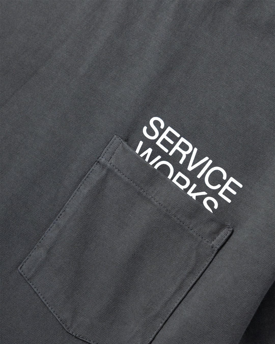 A Eckhaus Latta Shirt pictured on a model in front of a white background. The title of the product is Eckhaus Latta Eclipse Turtleneck - Stone and the image was taken by 199A®.