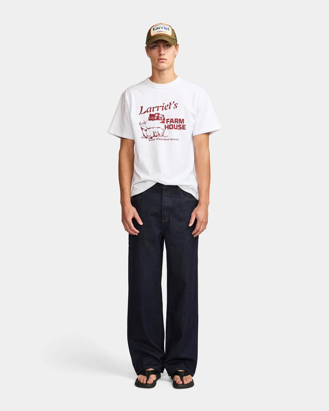 A Eckhaus Latta Shirt pictured on a model in front of a white background. The title of the product is Eckhaus Latta Eclipse Turtleneck - Stone and the image was taken by 199A®.
