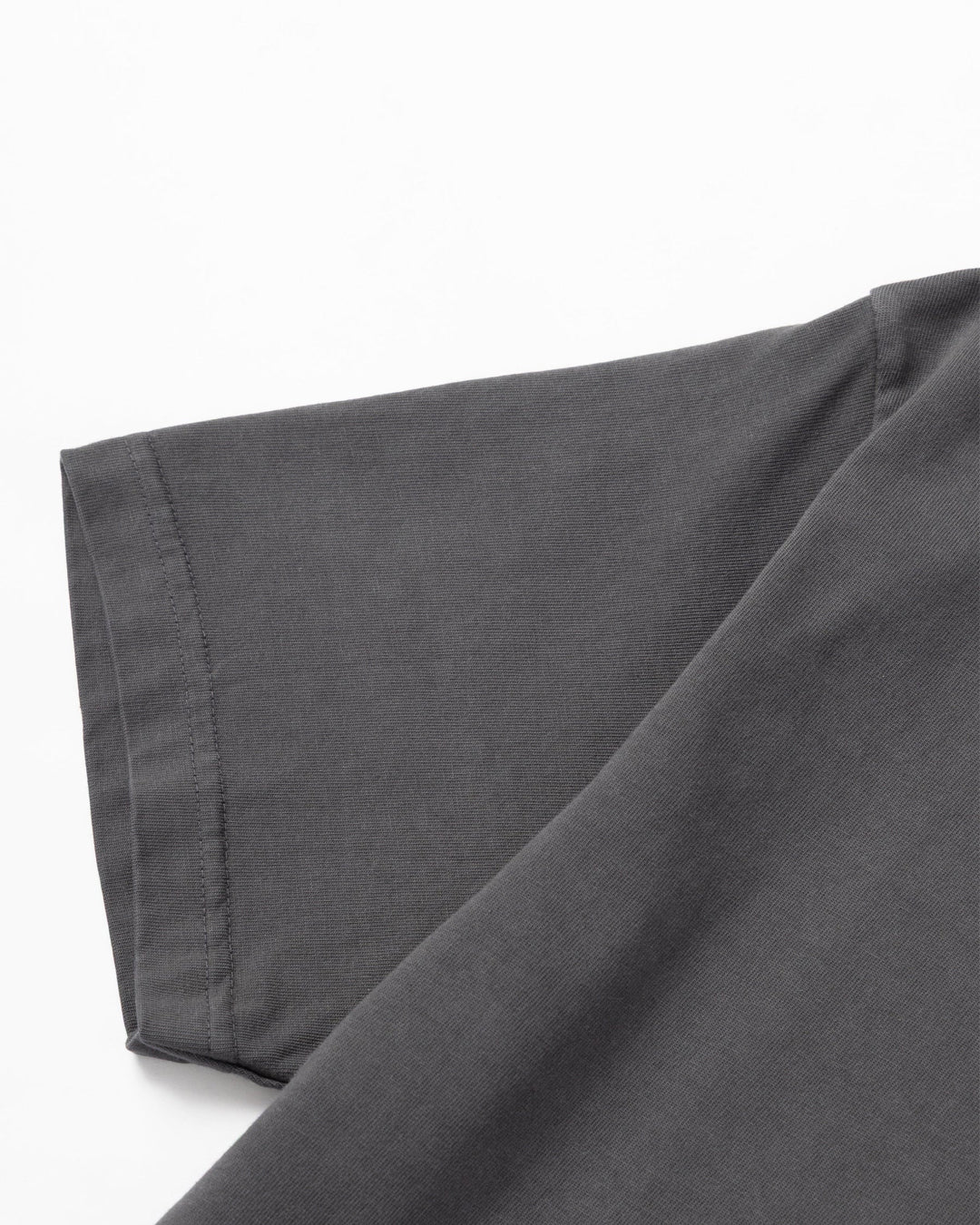 A Eckhaus Latta Shirt pictured on a model in front of a white background. The title of the product is Eckhaus Latta Eclipse Turtleneck - Stone and the image was taken by 199A®.