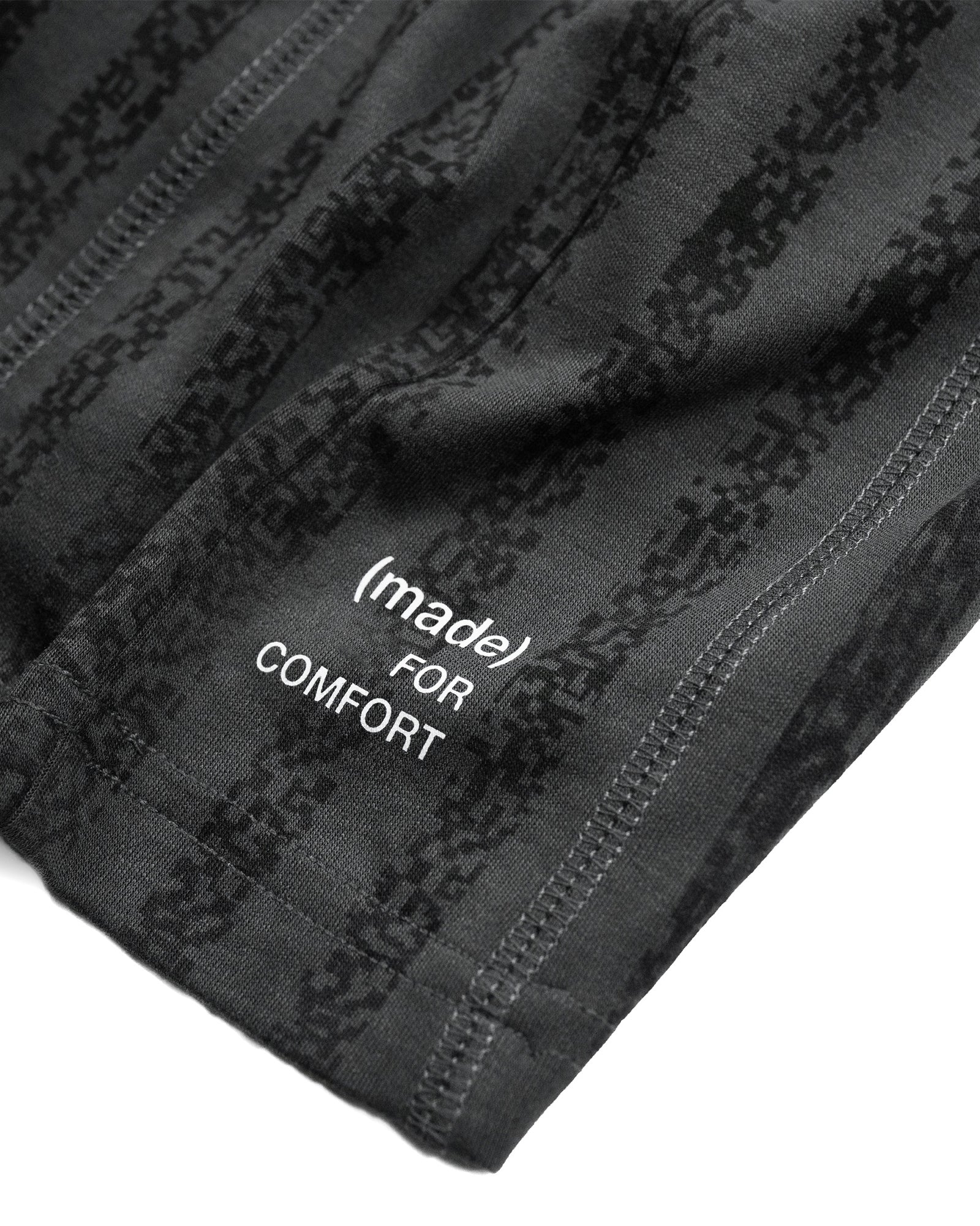 A Eckhaus Latta Shirt pictured on a model in front of a white background. The title of the product is Eckhaus Latta Eclipse Turtleneck - Stone and the image was taken by 199A®.