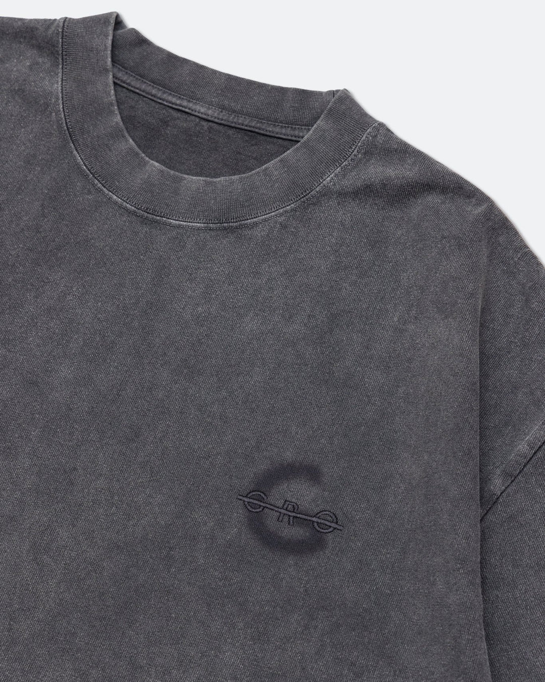 A Eckhaus Latta Shirt pictured on a model in front of a white background. The title of the product is Eckhaus Latta Eclipse Turtleneck - Stone and the image was taken by 199A®.