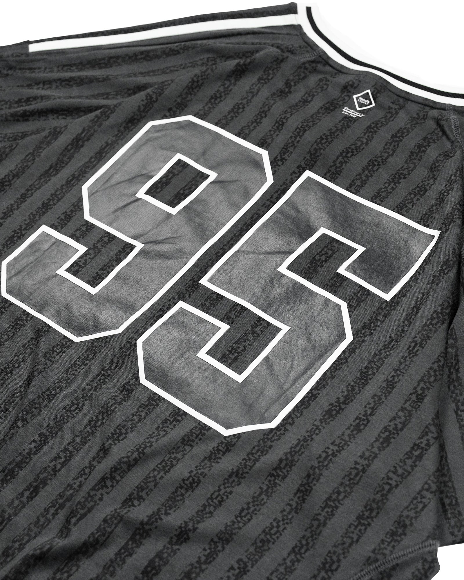 A Eckhaus Latta Shirt pictured on a model in front of a white background. The title of the product is Eckhaus Latta Eclipse Turtleneck - Stone and the image was taken by 199A®.