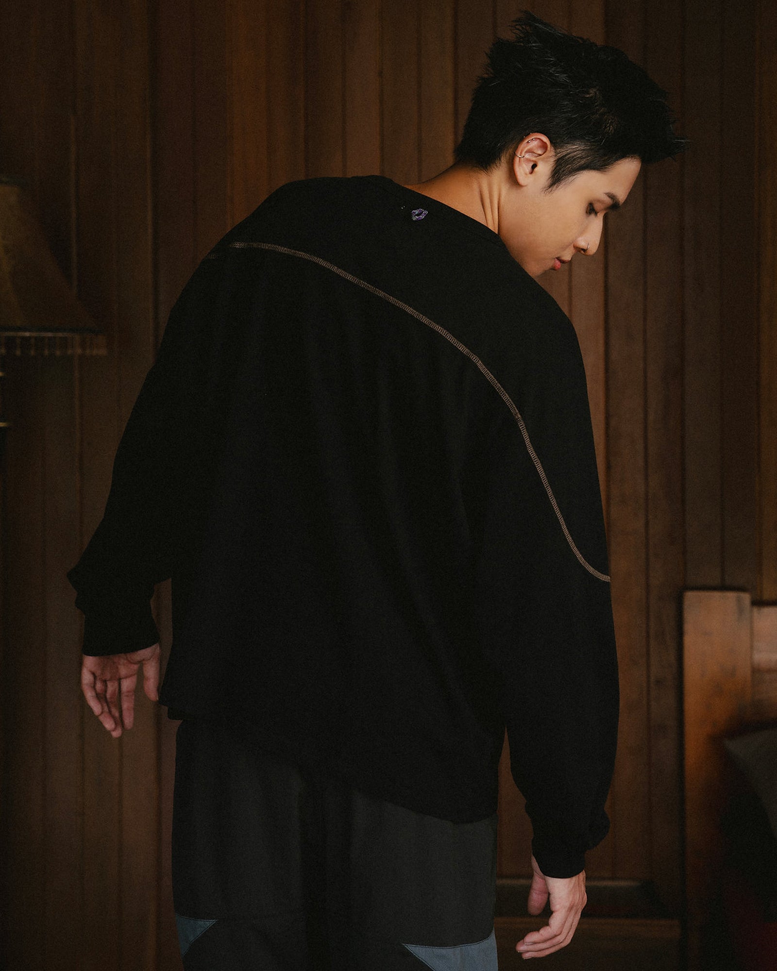 A Eckhaus Latta Shirt pictured on a model in front of a white background. The title of the product is Eckhaus Latta Eclipse Turtleneck - Stone and the image was taken by 199A®.