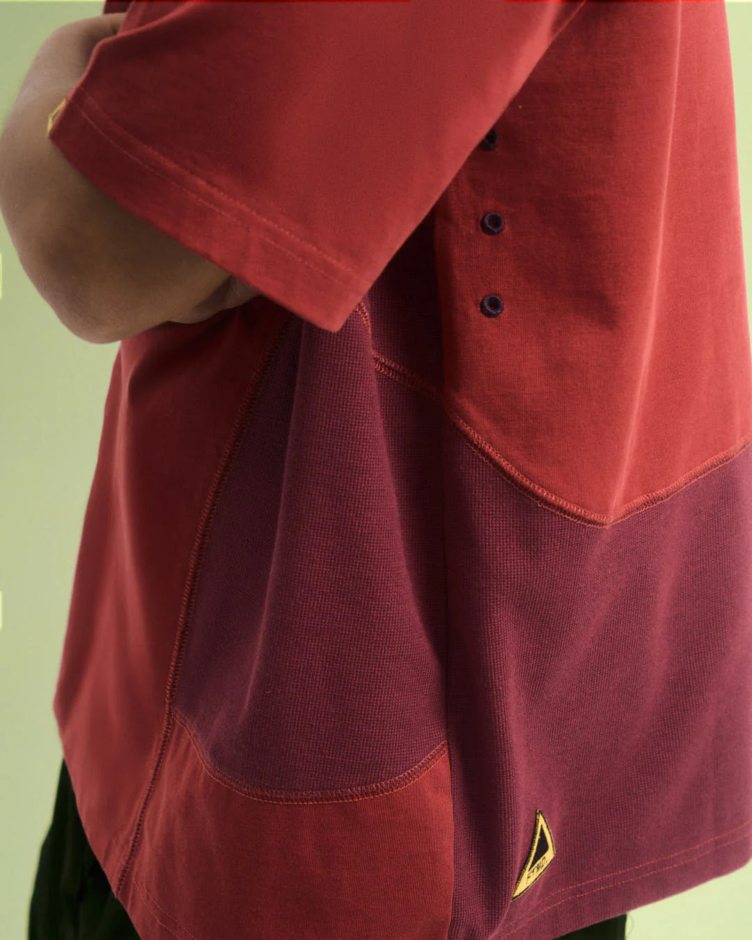 A Eckhaus Latta Shirt pictured on a model in front of a white background. The title of the product is Eckhaus Latta Eclipse Turtleneck - Stone and the image was taken by 199A®.