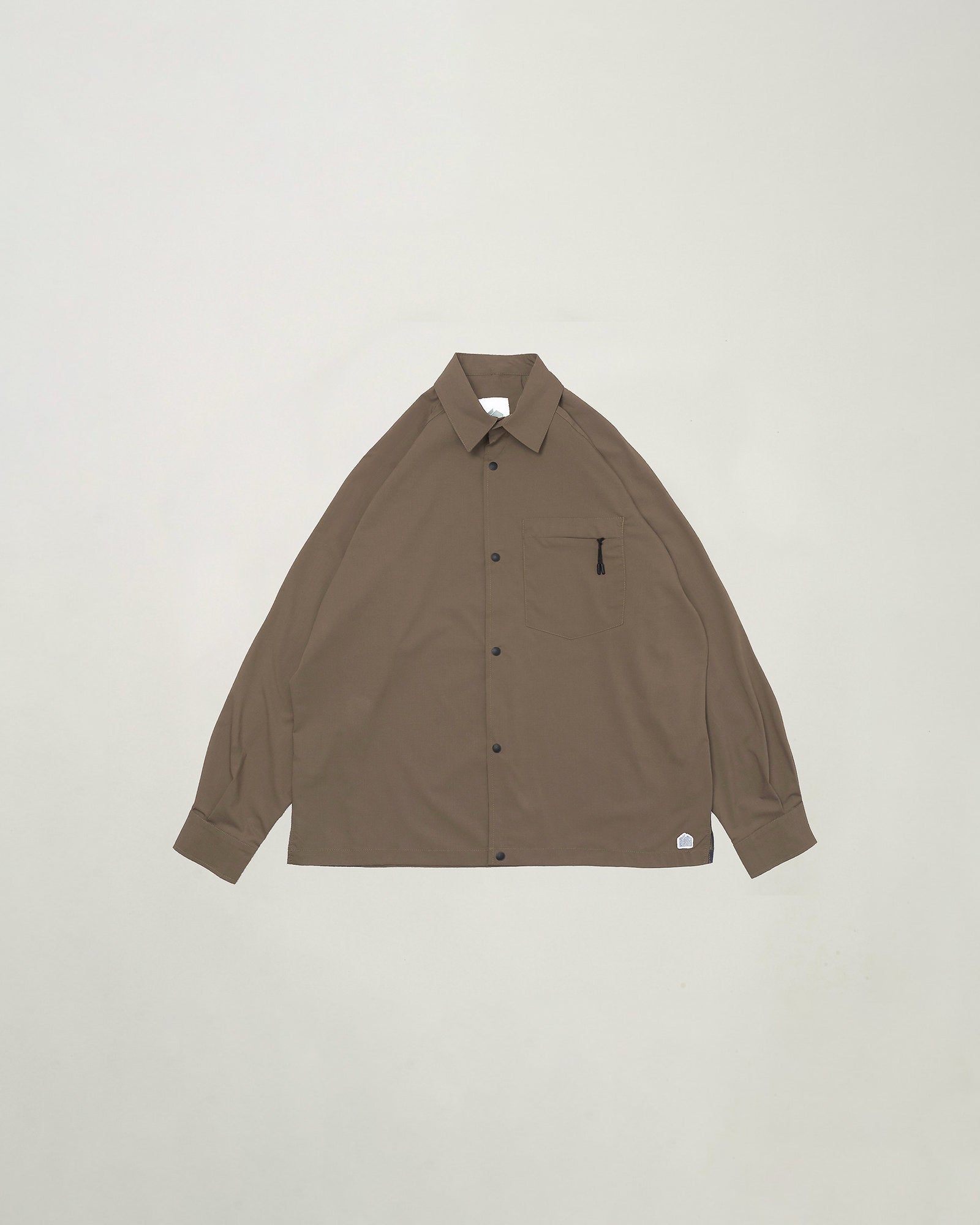 A Eckhaus Latta Shirt pictured on a model in front of a white background. The title of the product is Eckhaus Latta Eclipse Turtleneck - Stone and the image was taken by 199A®.