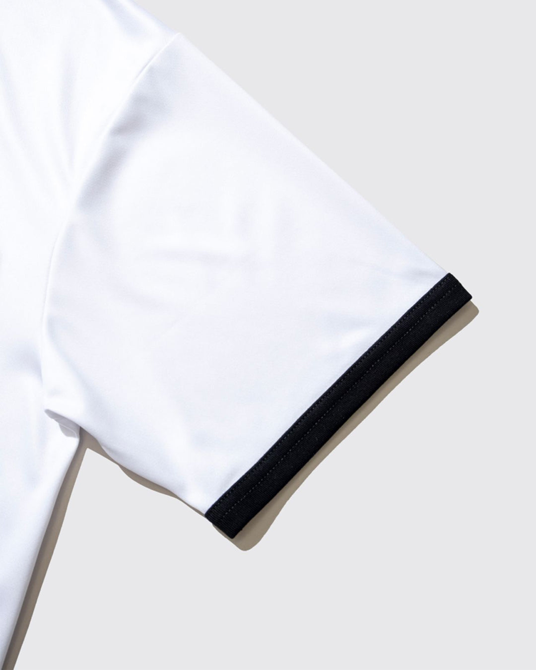 A Eckhaus Latta Shirt pictured on a model in front of a white background. The title of the product is Eckhaus Latta Eclipse Turtleneck - Stone and the image was taken by 199A®.