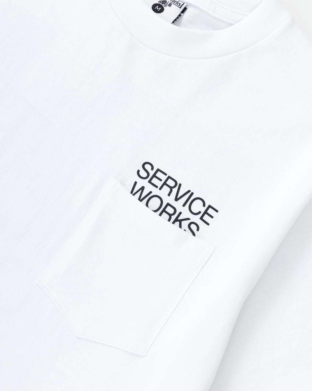 A Eckhaus Latta Shirt pictured on a model in front of a white background. The title of the product is Eckhaus Latta Eclipse Turtleneck - Stone and the image was taken by 199A®.