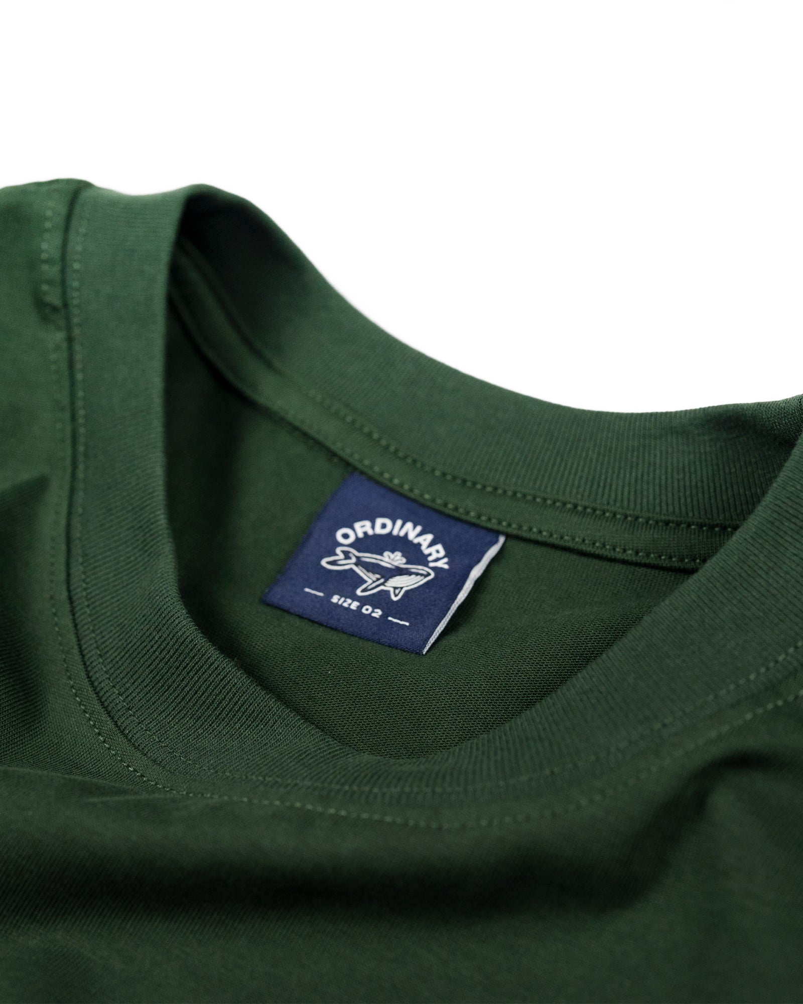 A Eckhaus Latta Shirt pictured on a model in front of a white background. The title of the product is Eckhaus Latta Eclipse Turtleneck - Stone and the image was taken by 199A®.