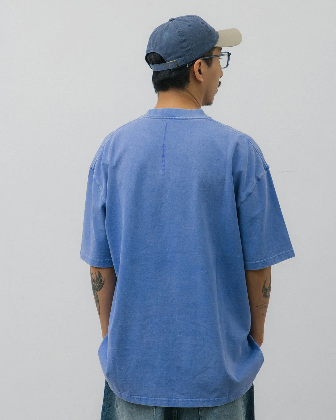 A Eckhaus Latta Shirt pictured on a model in front of a white background. The title of the product is Eckhaus Latta Eclipse Turtleneck - Stone and the image was taken by 199A®.
