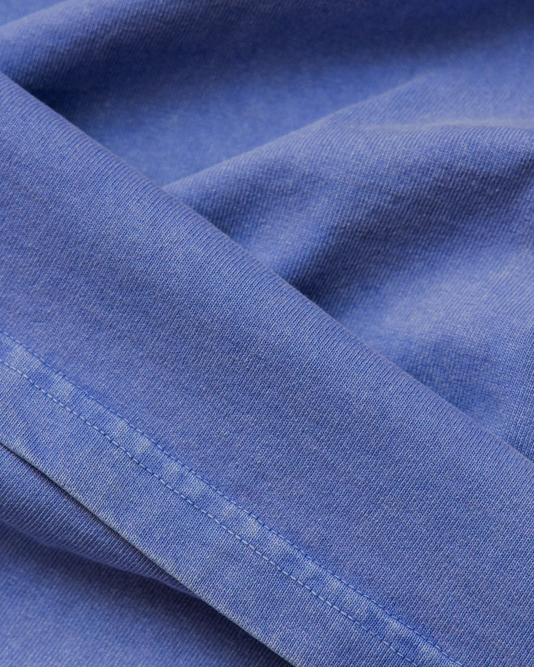 A Eckhaus Latta Shirt pictured on a model in front of a white background. The title of the product is Eckhaus Latta Eclipse Turtleneck - Stone and the image was taken by 199A®.