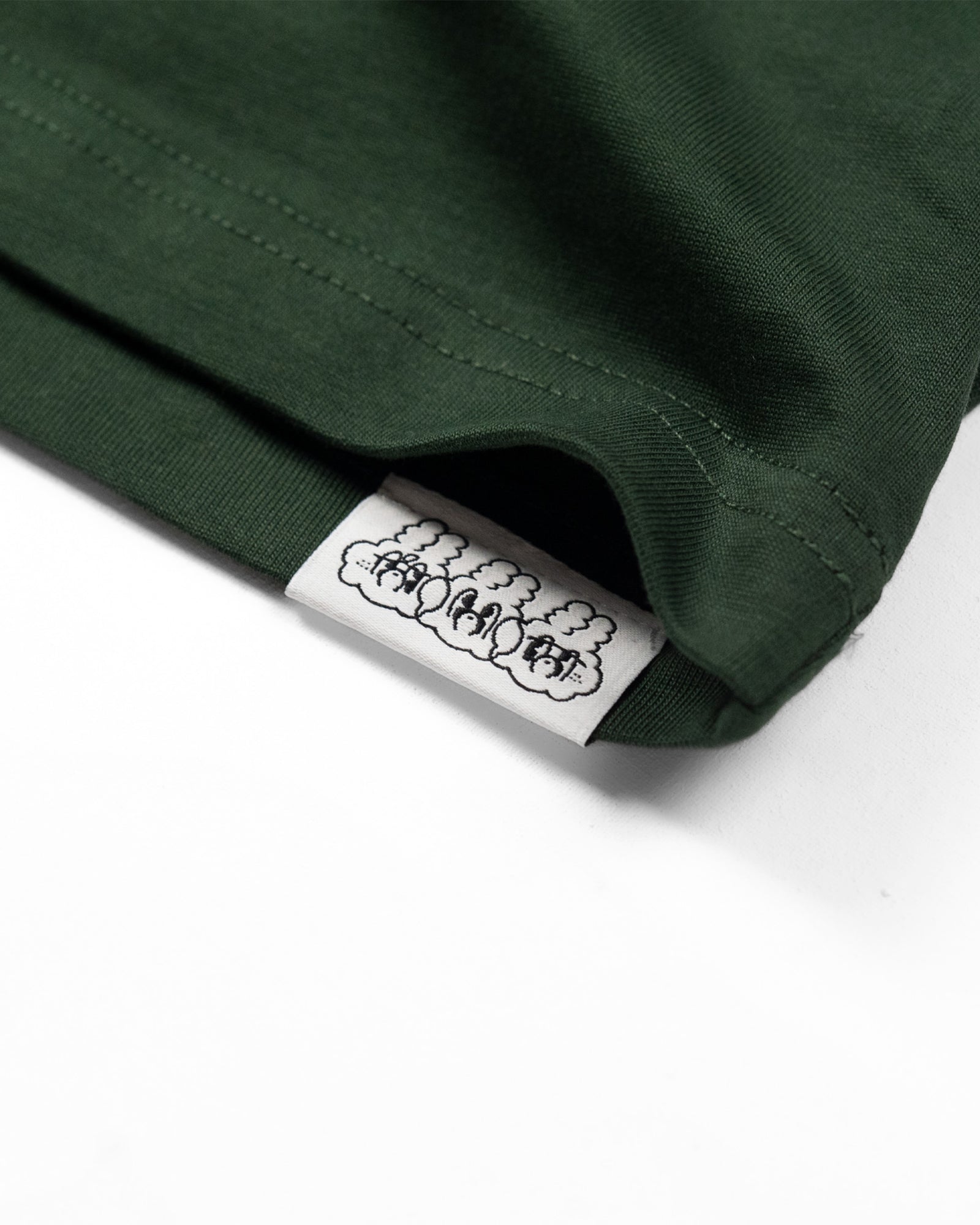 A Eckhaus Latta Shirt pictured on a model in front of a white background. The title of the product is Eckhaus Latta Eclipse Turtleneck - Stone and the image was taken by 199A®.