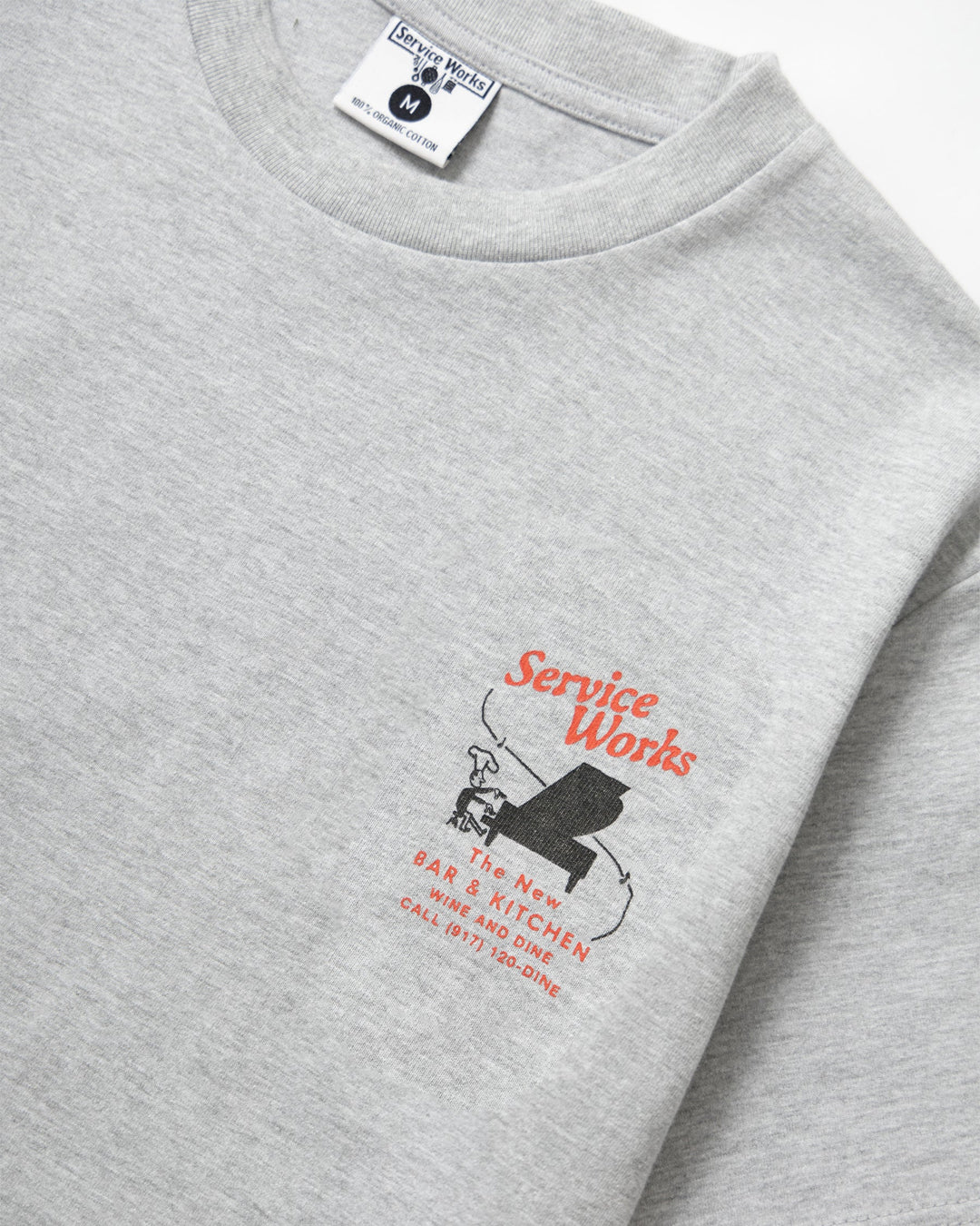 A Eckhaus Latta Shirt pictured on a model in front of a white background. The title of the product is Eckhaus Latta Eclipse Turtleneck - Stone and the image was taken by 199A®.