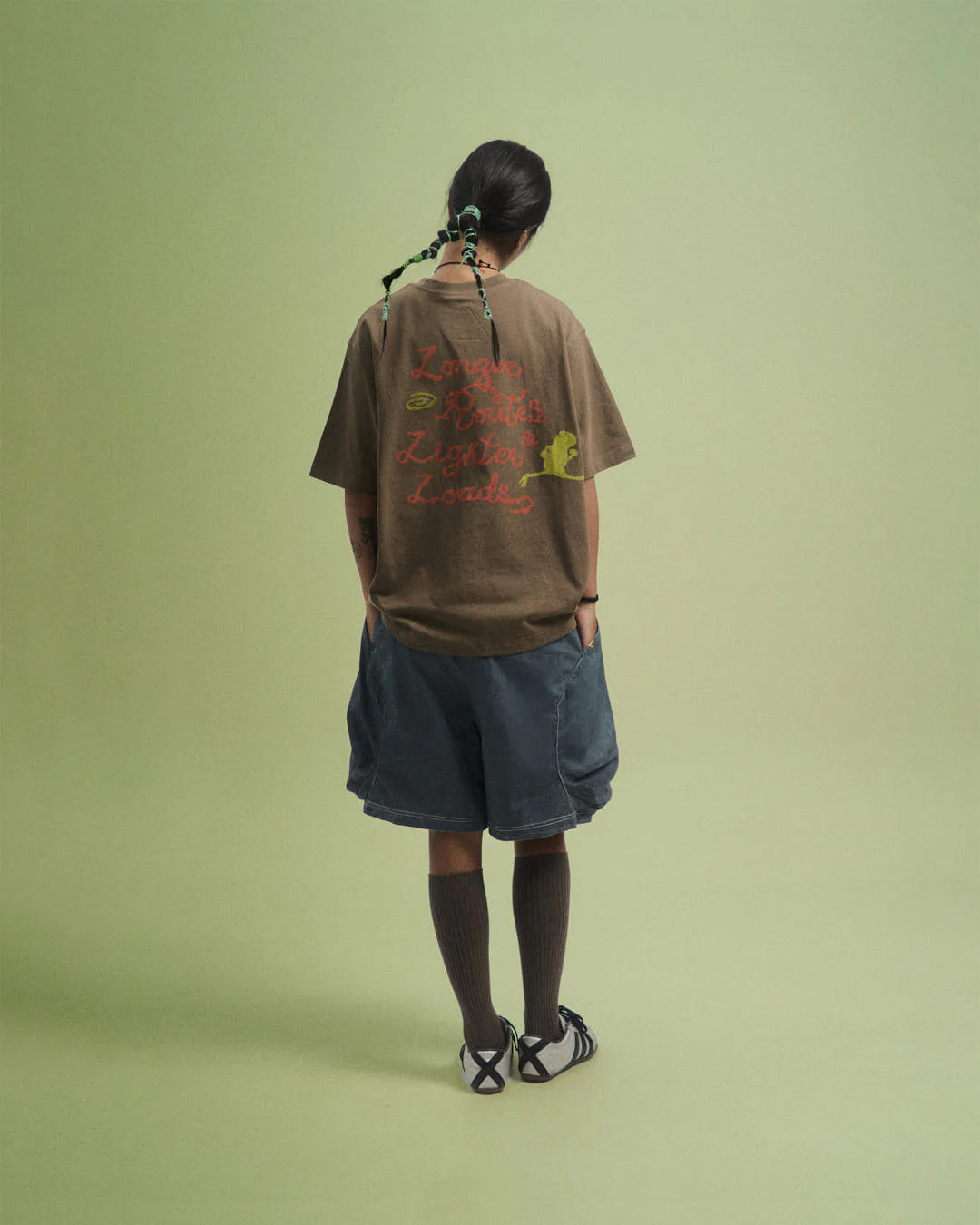 A Eckhaus Latta Shirt pictured on a model in front of a white background. The title of the product is Eckhaus Latta Eclipse Turtleneck - Stone and the image was taken by 199A®.