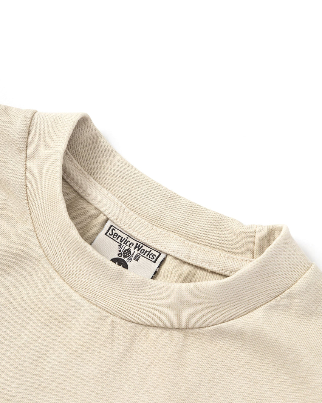 A Eckhaus Latta Shirt pictured on a model in front of a white background. The title of the product is Eckhaus Latta Eclipse Turtleneck - Stone and the image was taken by 199A®.