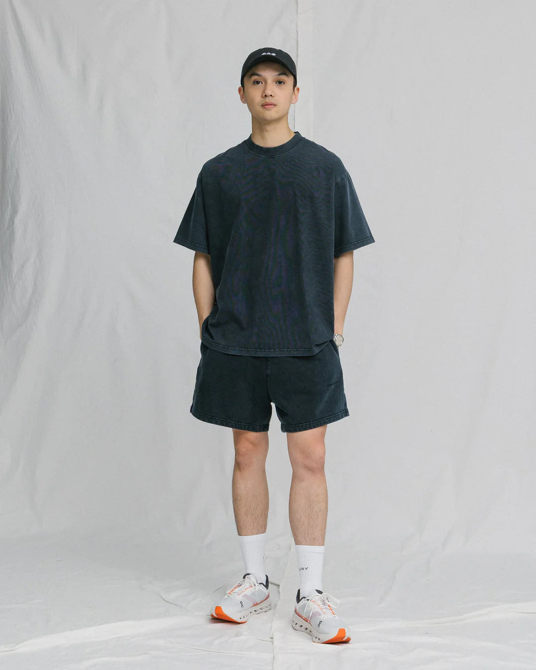 A Eckhaus Latta Shirt pictured on a model in front of a white background. The title of the product is Eckhaus Latta Eclipse Turtleneck - Stone and the image was taken by 199A®.