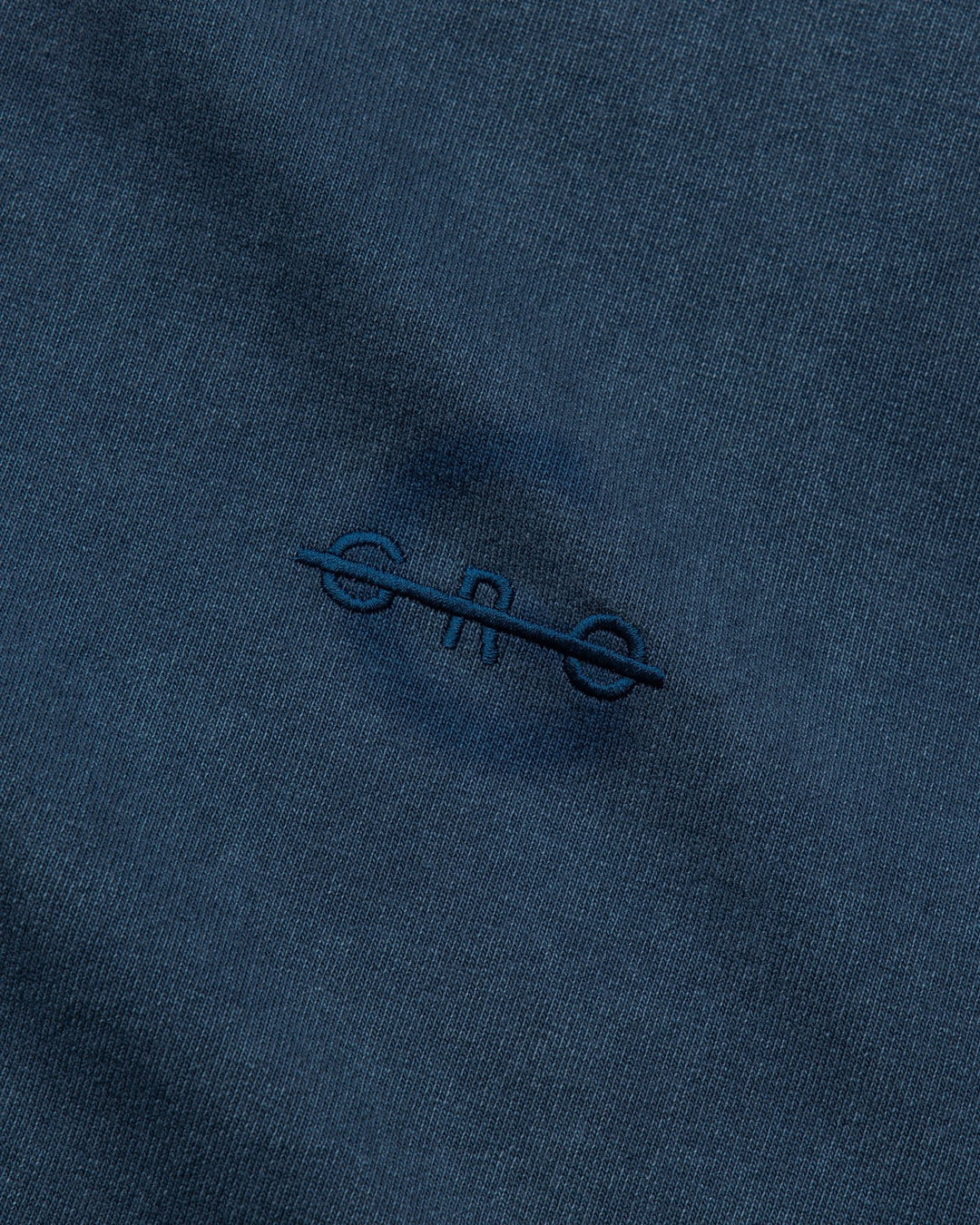 A Eckhaus Latta Shirt pictured on a model in front of a white background. The title of the product is Eckhaus Latta Eclipse Turtleneck - Stone and the image was taken by 199A®.