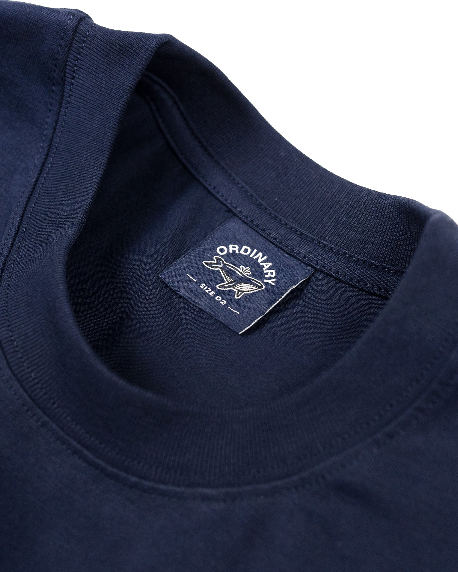 A Eckhaus Latta Shirt pictured on a model in front of a white background. The title of the product is Eckhaus Latta Eclipse Turtleneck - Stone and the image was taken by 199A®.